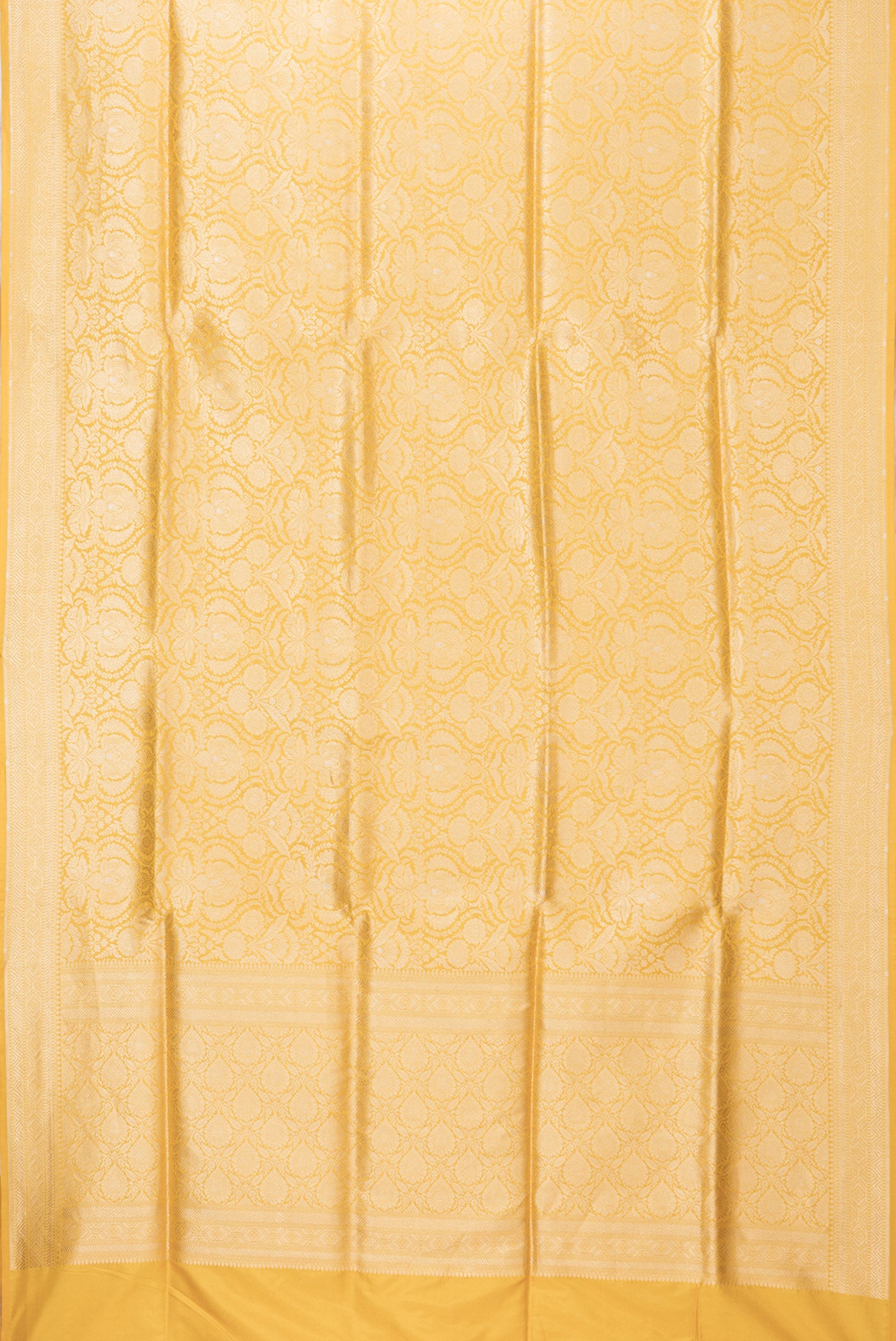 Flat view of Yellow Dual Tone Banarasi Silk Saree with Zari Brocade on the body and Zari Border. 