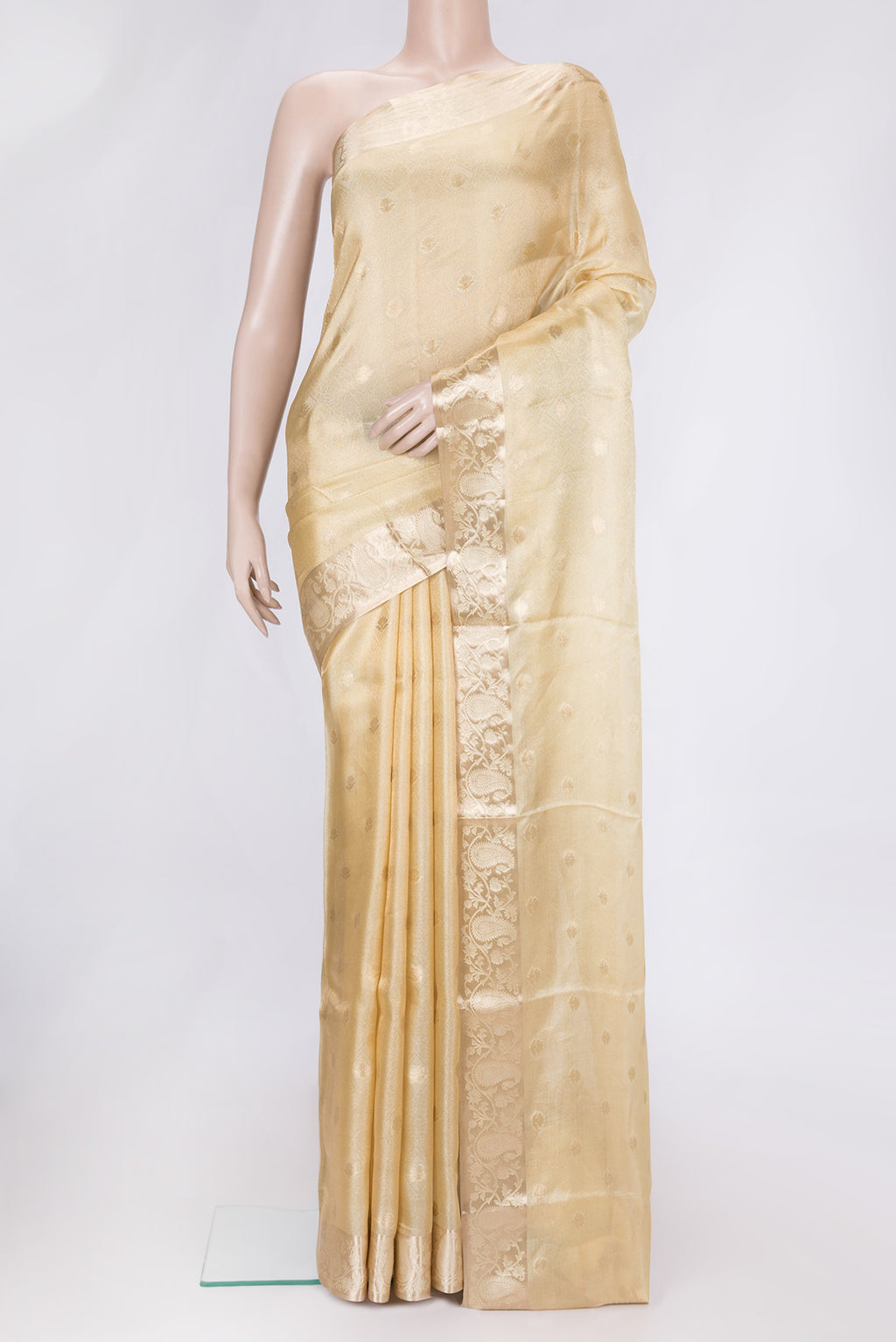 Sandal Dual Tone Organza Silk Saree with Zari Brocade on the body and Zari Border.  displayed on a mannequin
