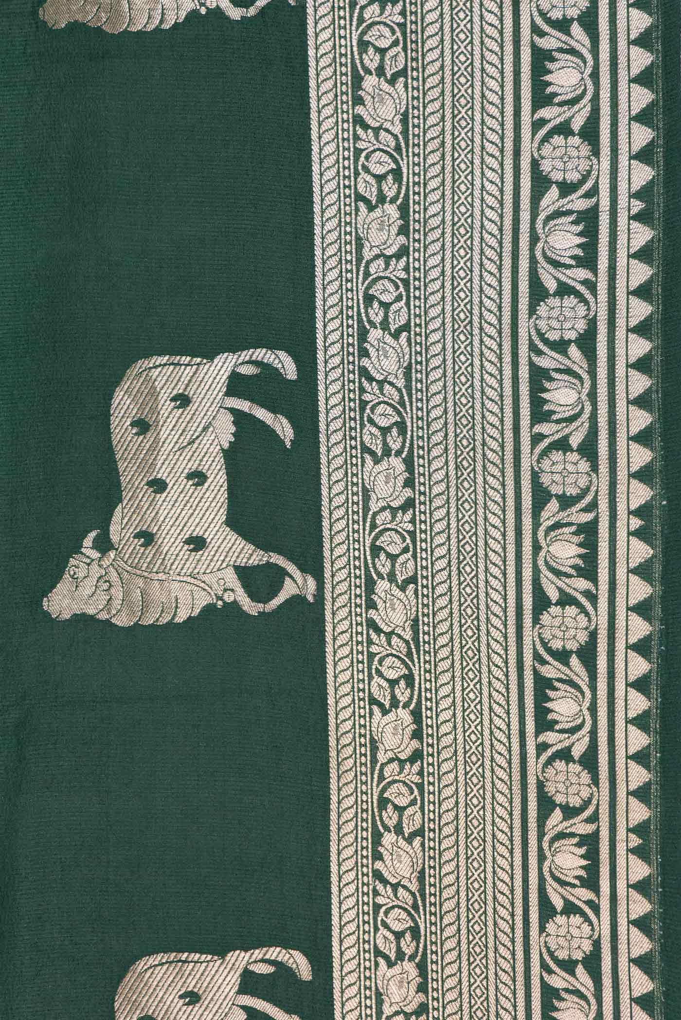 Border image of Green Dual Tone Tussar Silk Saree with Zari Butta on the body and Zari Border