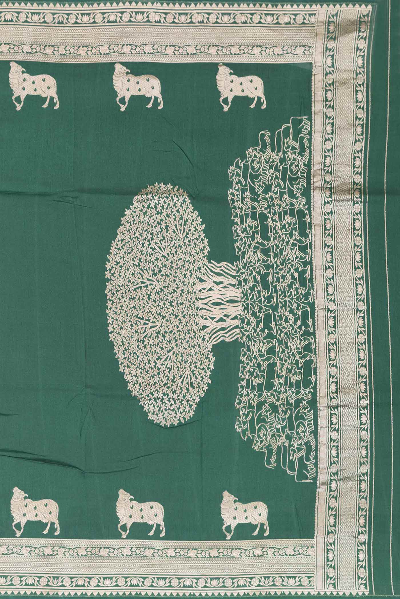 Close up image of the pallu of Green Dual Tone Tussar Silk Saree with Zari Butta on the body and Zari Border