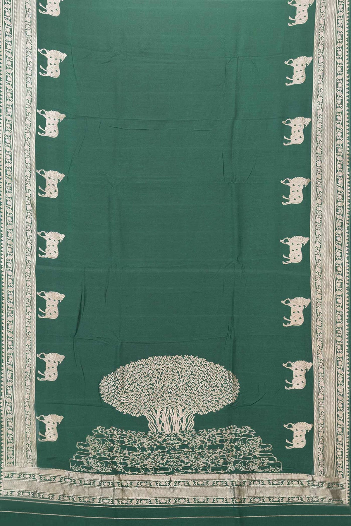Flat view of Green Dual Tone Tussar Silk Saree with Zari Butta on the body and Zari Border