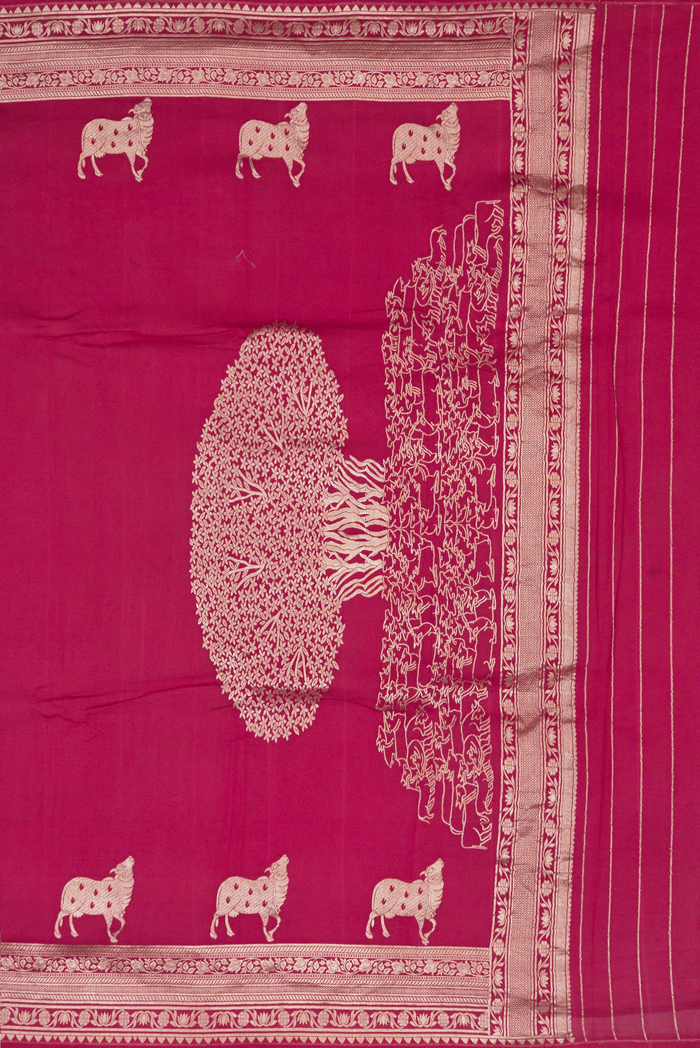 Close up image of the pallu of Magenta Tussar Silk Saree with Zari Butta on the body and Fancy Border. 