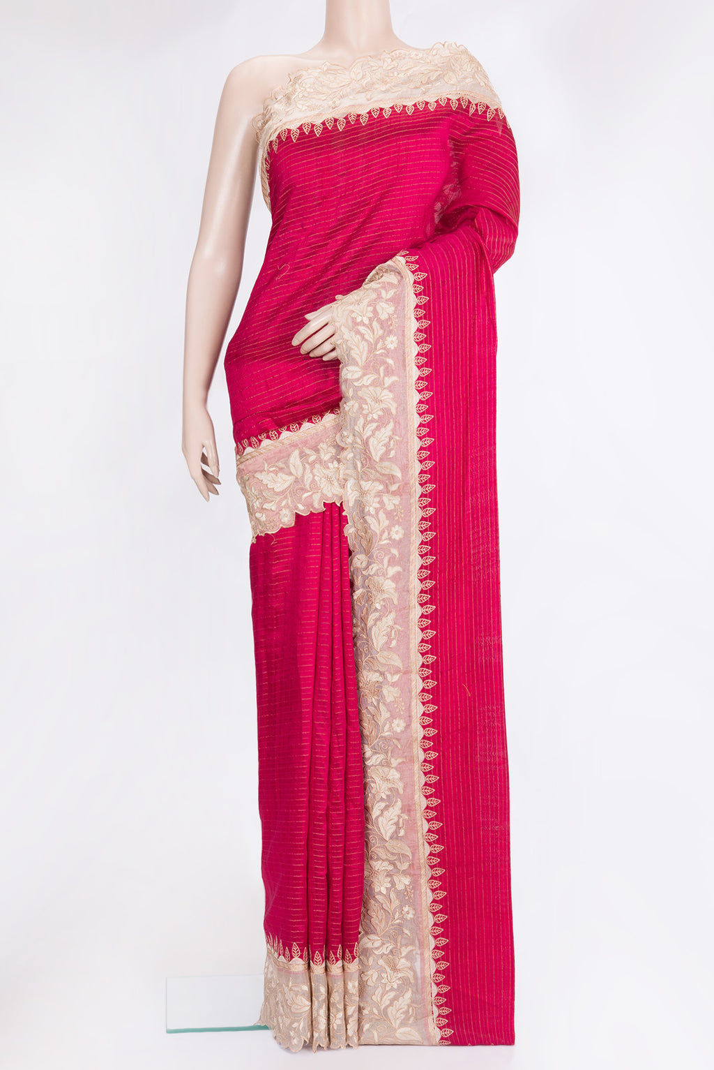 Dark Pink Tussar Silk Saree with Stripes on the body and Fancy Border.  displayed on a mannequin