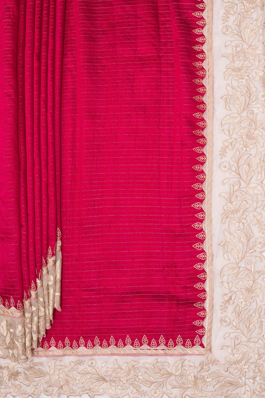 Pleats and pallu of Dark Pink Tussar Silk Saree with Stripes on the body and Fancy Border. 