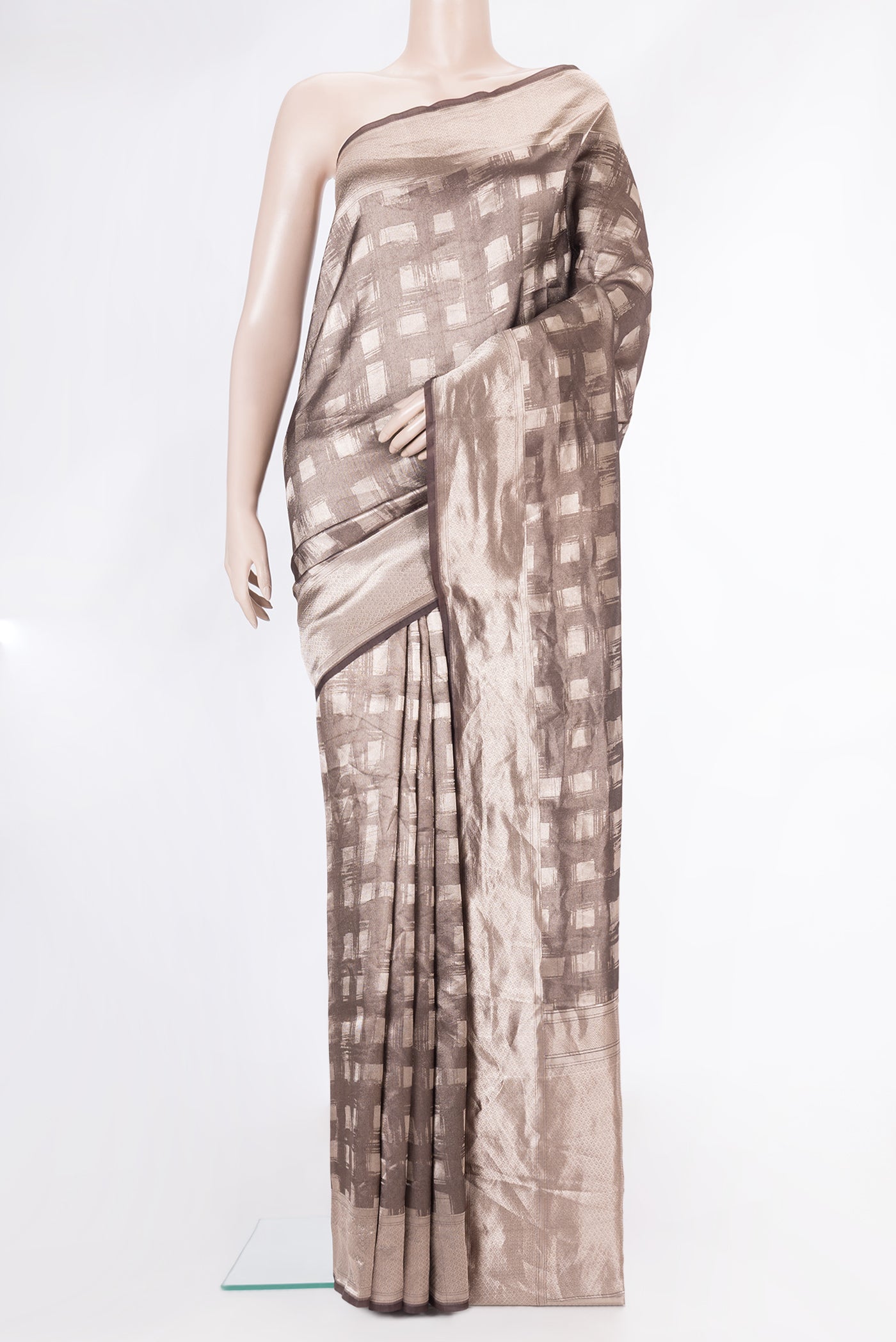 Brown Dual Tone Banarasi Silk Saree with Zari Brocade on the body and Zari Border.  displayed on a mannequin