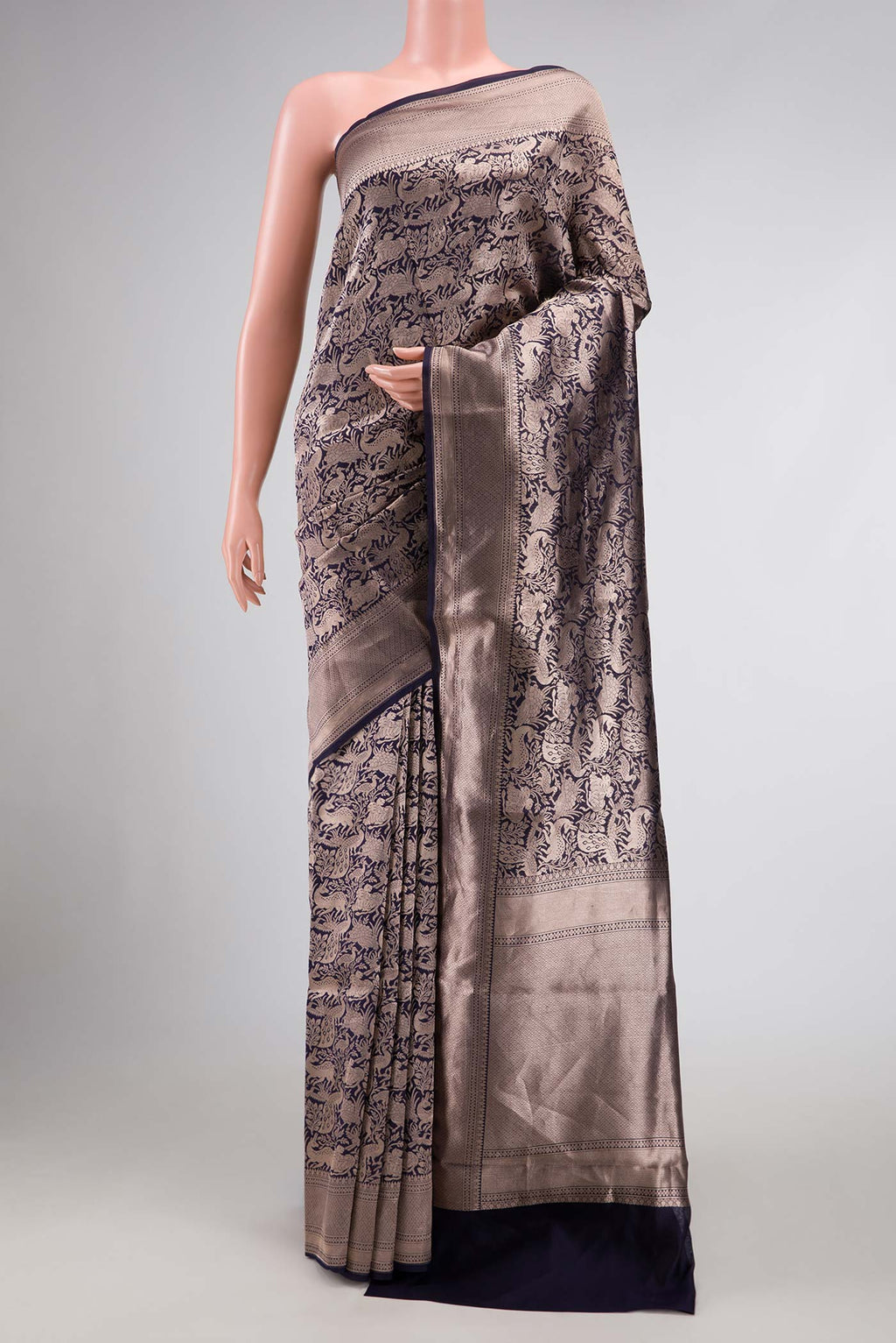 Navy Blue Dual Tone Banarasi Silk Saree with Zari Brocade on the body and Zari Border displayed on a mannequin
