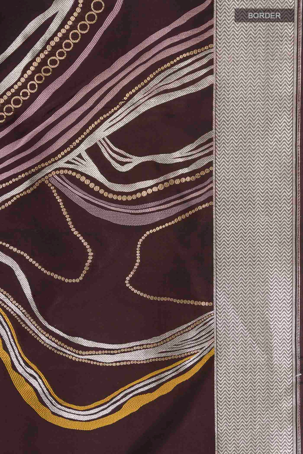 Border image of Brown Banarasi Silk Saree with Zari Butta on the body and Zari Border