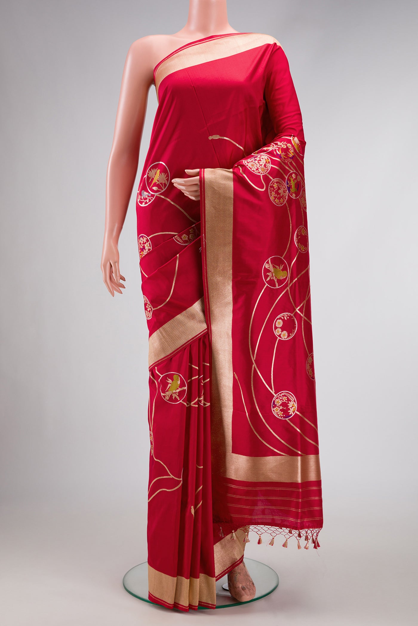 Red Dual Tone Banarasi Silk Saree with Zari Brocade on the body and Zari Border.  displayed on a mannequin