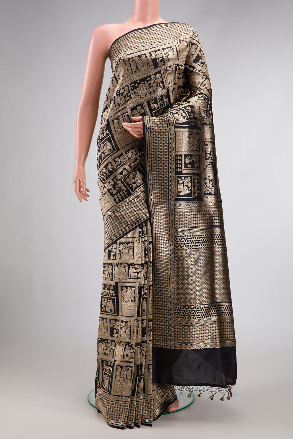 Black Dual Tone Banarasi Silk Saree with Zari Brocade on the body and Zari Border.  displayed on a mannequin