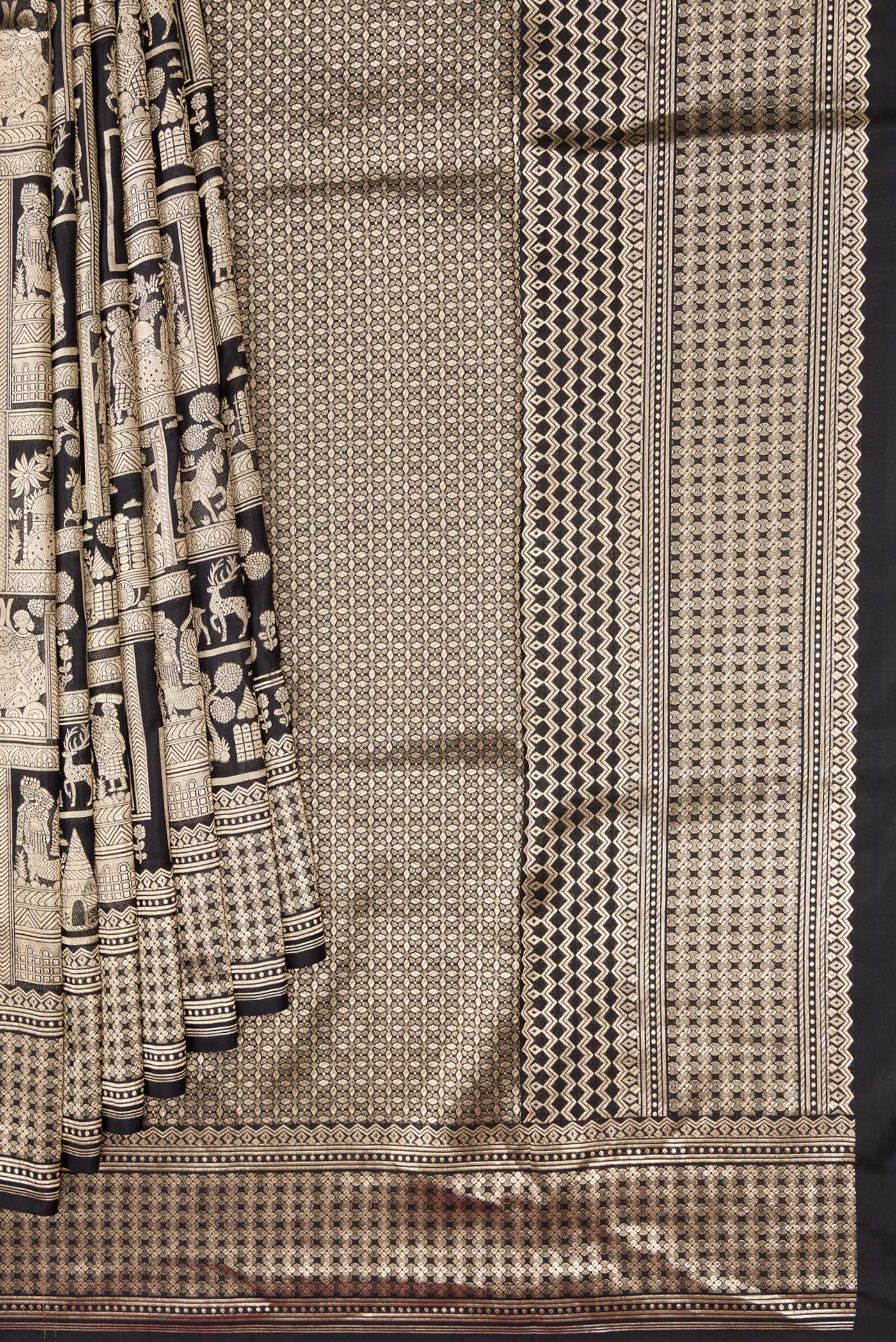 Pleats and pallu of Black Dual Tone Banarasi Silk Saree with Zari Brocade on the body and Zari Border. 