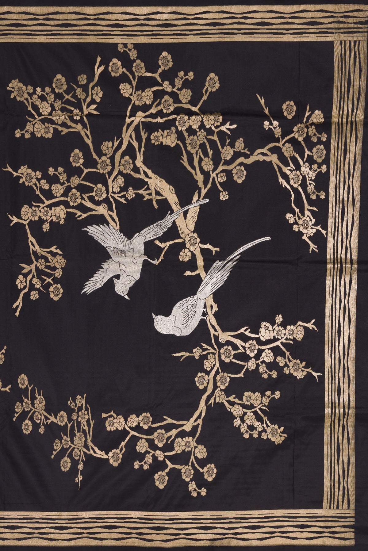 Close up image of the pallu of Black Dual Tone Banarasi Silk Saree with Zari Brocade on the body and Fancy Border. 
