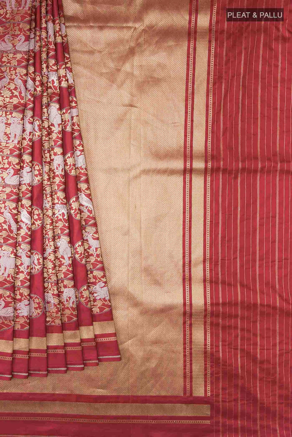 Pleats and pallu of Maroon Banarasi Silk Saree with Zari Butta on the body and Zari Border