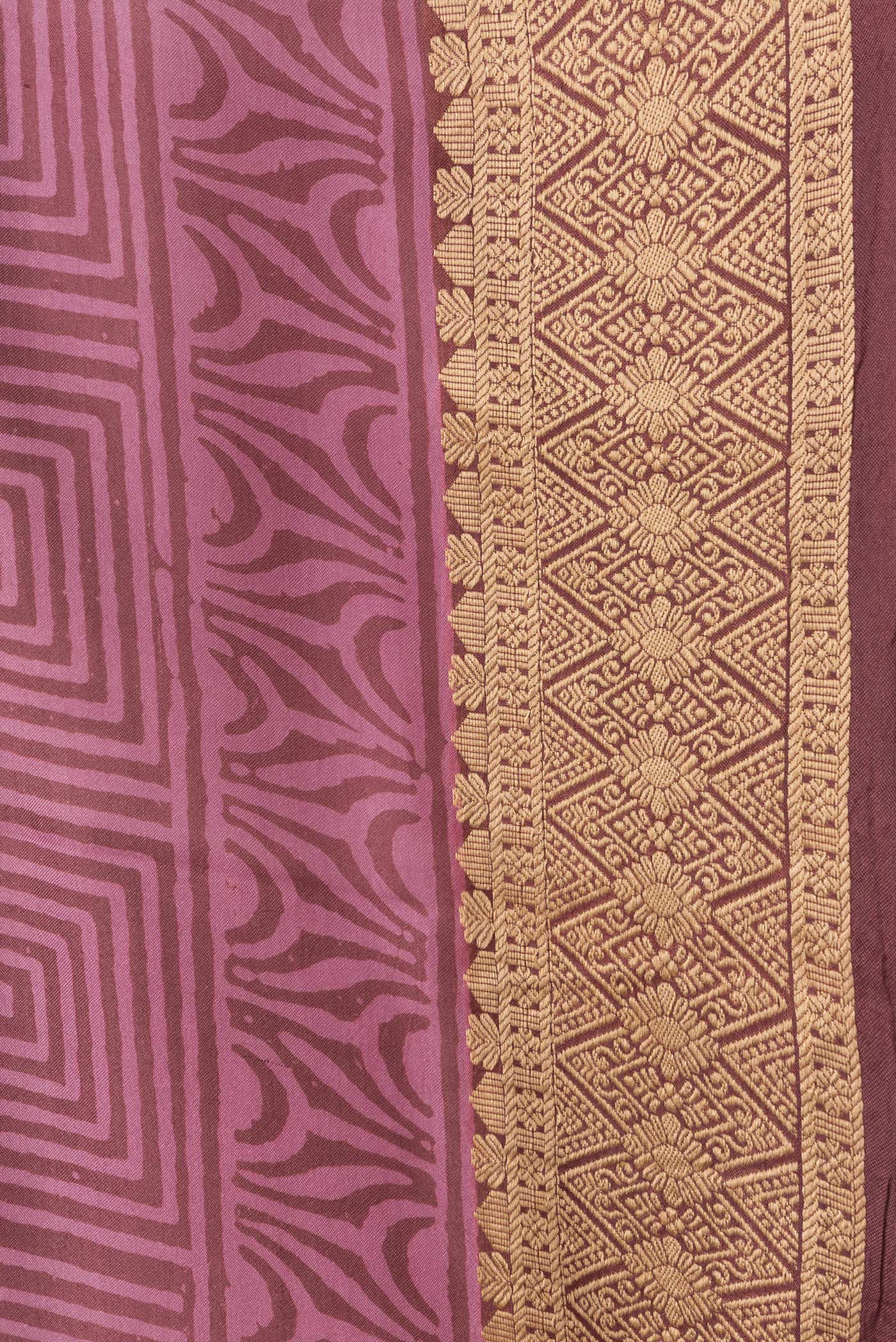 Border image of Brown Dual Tone Printed Silk Saree with Printed design on the body and Thread Border. 