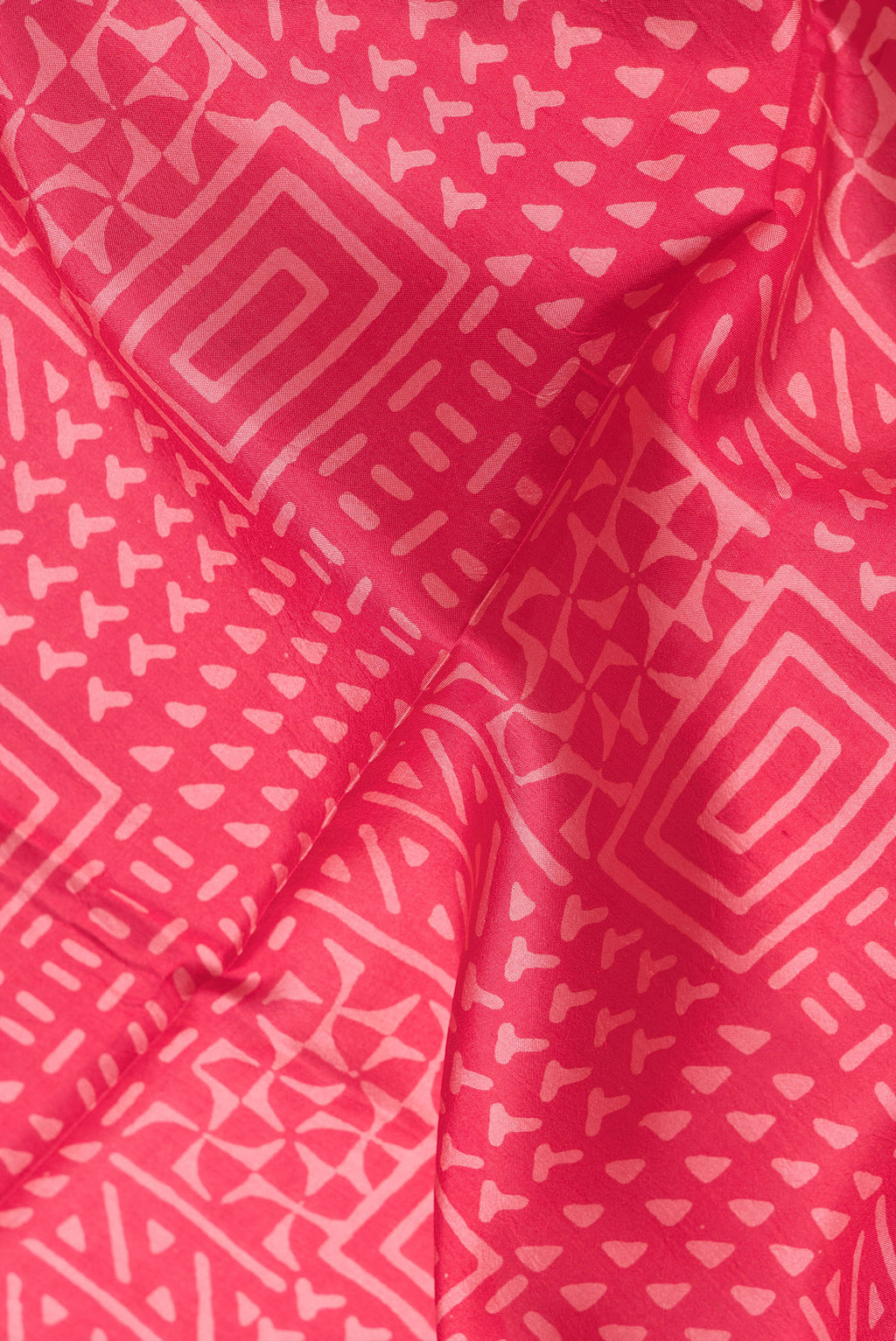 Close up of Pink Dual Tone Printed Silk Saree with Printed design on the body and Printed Border.  displaying folds