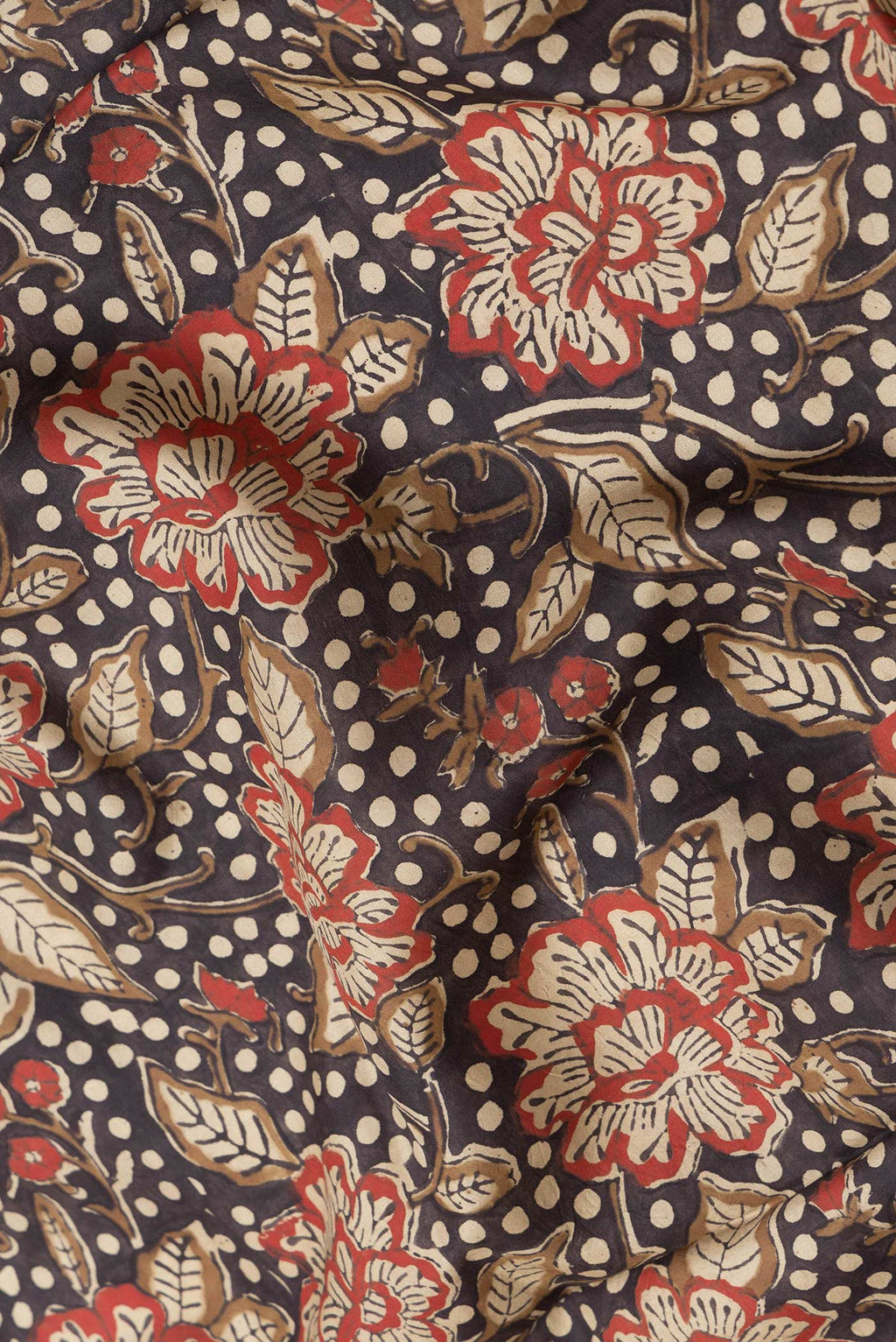 Close up of Coffee Brown Dual Tone Printed Silk Saree with Printed design on the body and Printed Border.  displaying folds