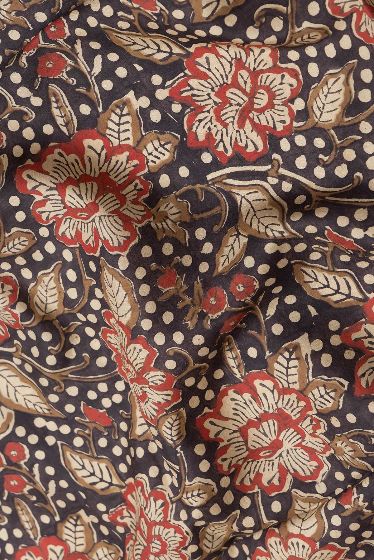 Close up of Coffee Brown Dual Tone Printed Silk Saree with Printed design on the body and Printed Border.  displaying folds