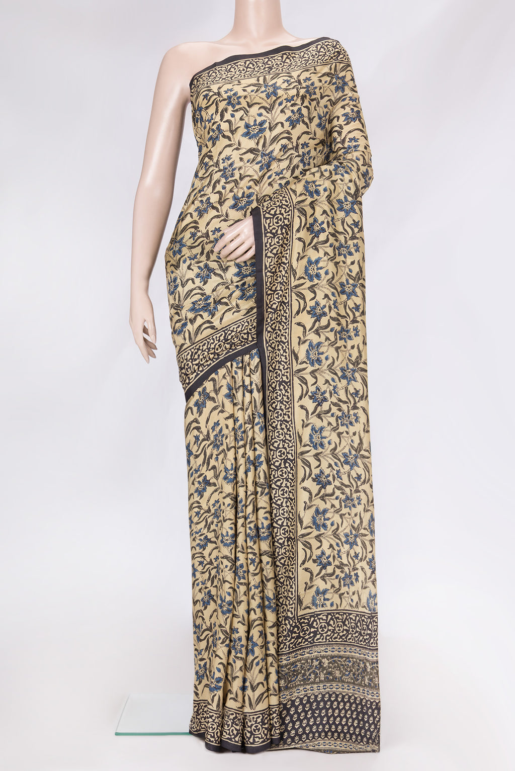 Beige Dual Tone Printed Silk Saree with Printed design on the body and Printed Border.  displayed on a mannequin