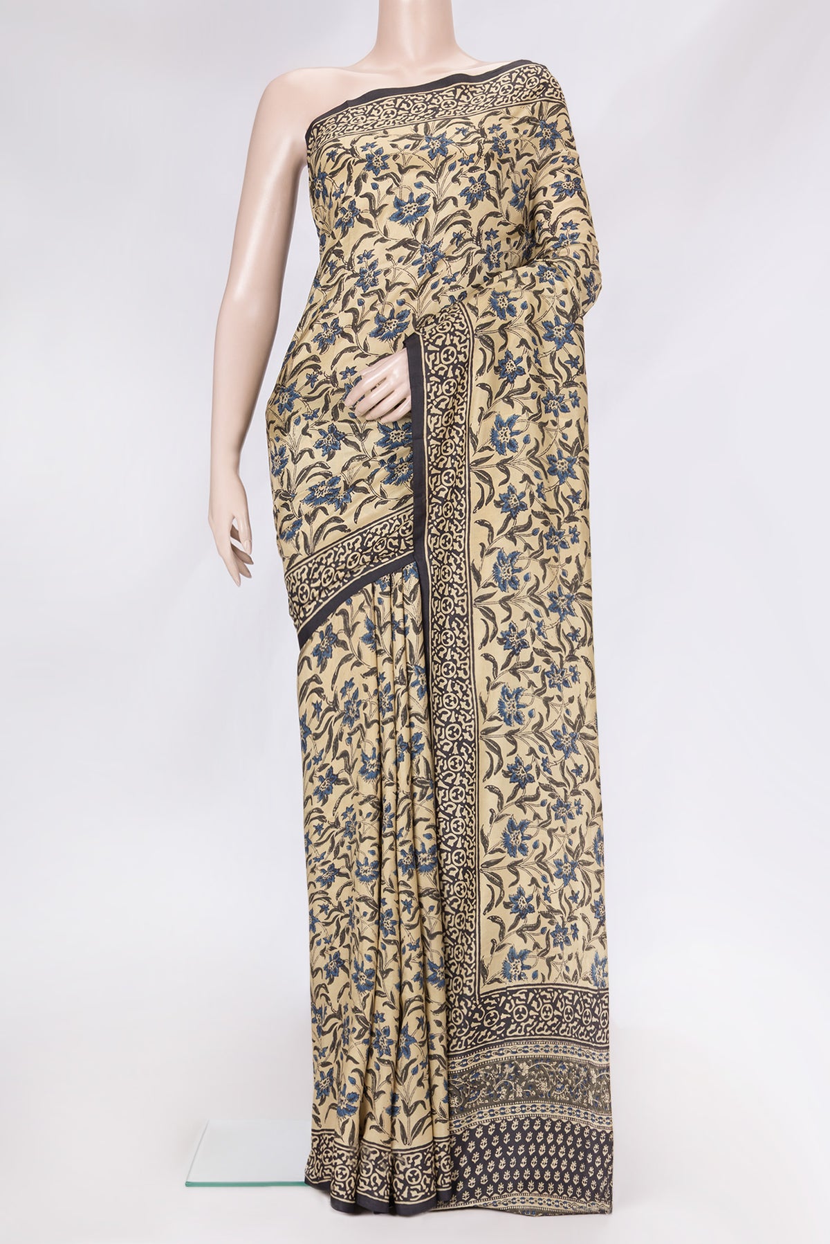 Beige Dual Tone Printed Silk Saree with Printed design on the body and Printed Border.  displayed on a mannequin
