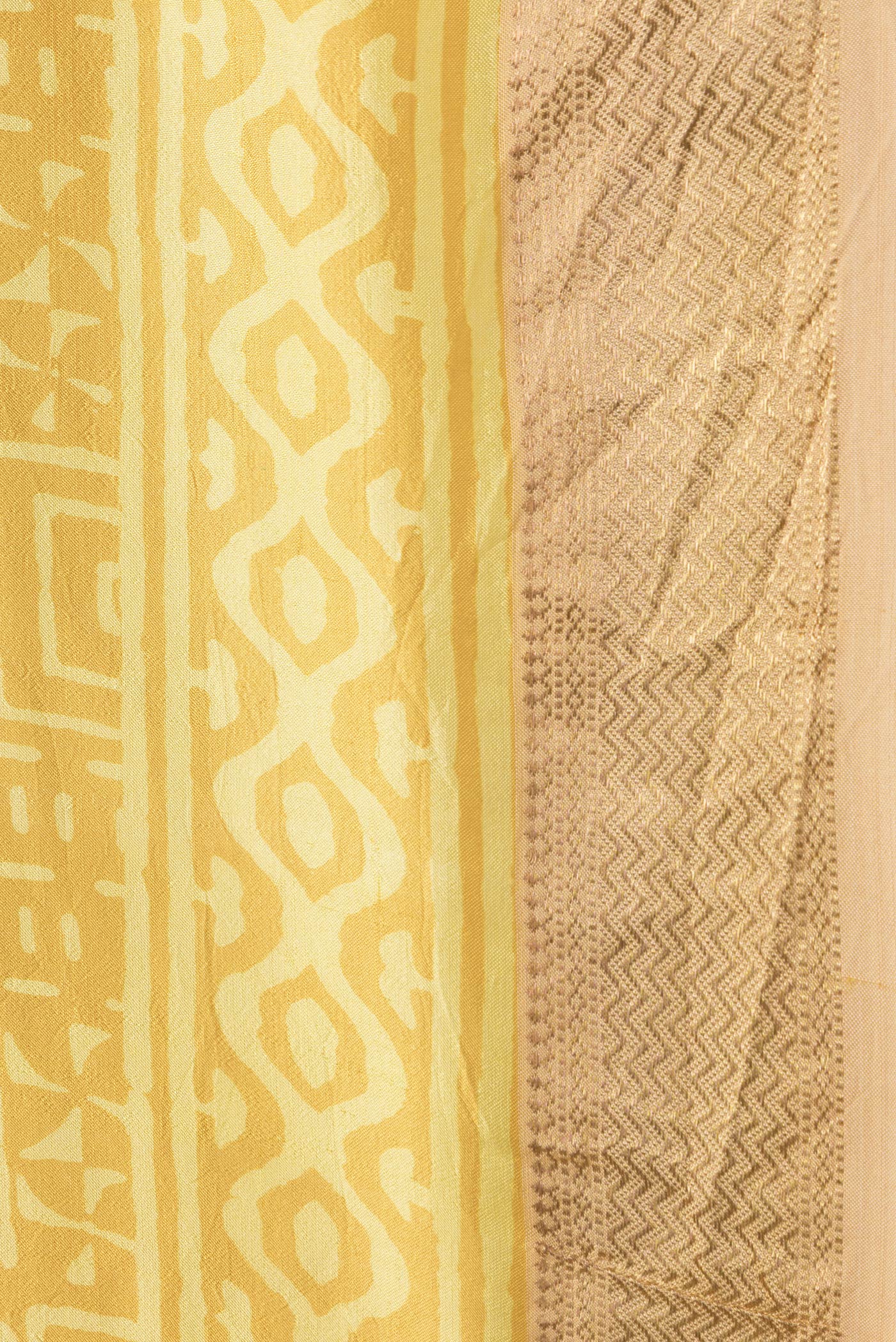 Border image of Mustard Dual Tone Printed Silk Saree with Printed design on the body and Zari Border. 