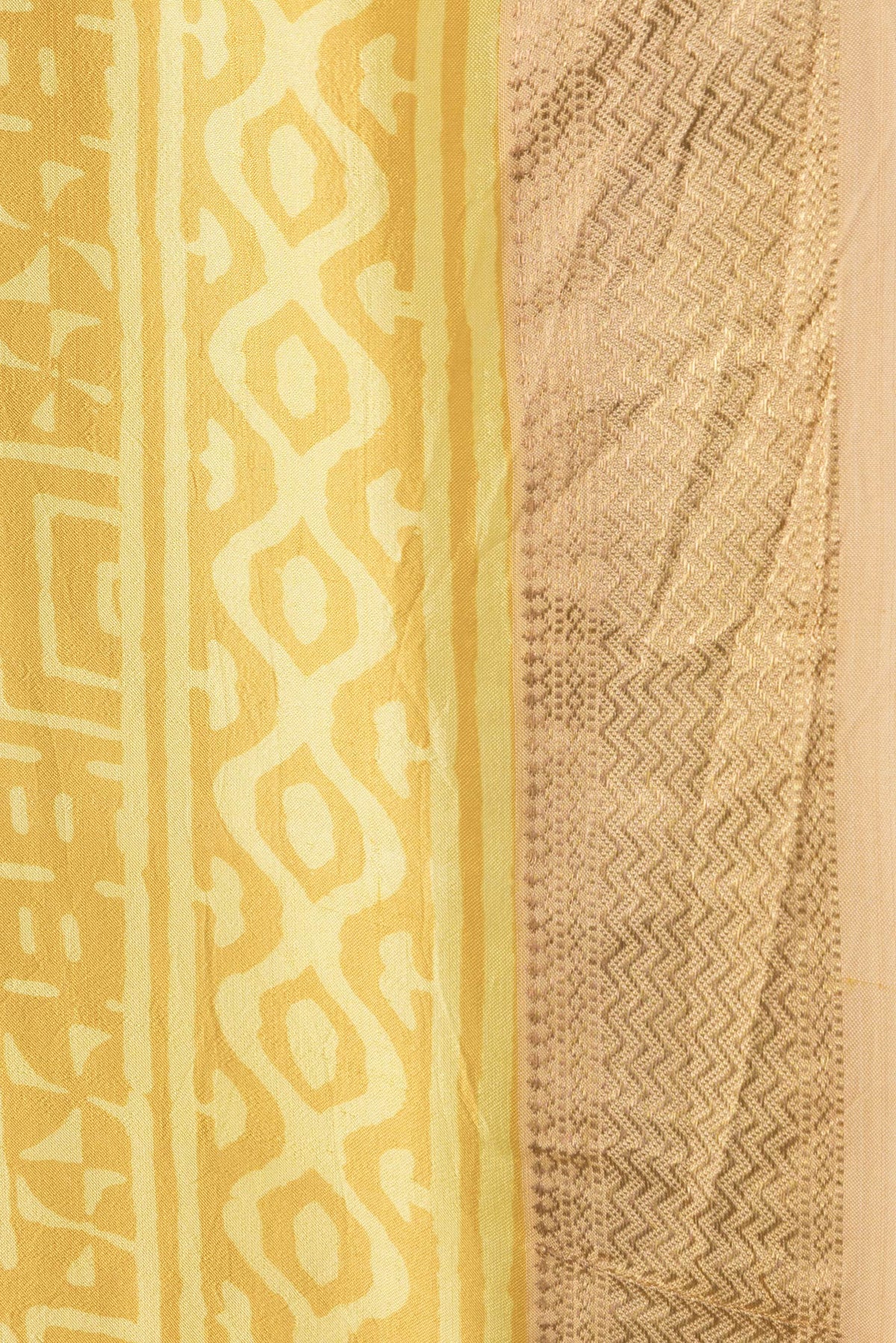 Border image of Mustard Dual Tone Printed Silk Saree with Printed design on the body and Zari Border. 