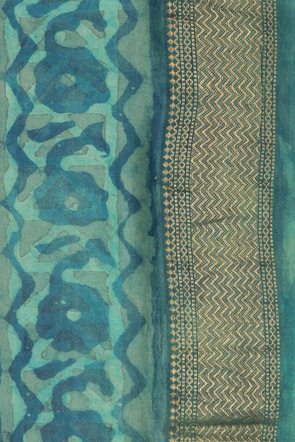 Border image of Pure Silk Blue Dual Tone Tussar Saree with Printed design on the body and Zari Border. 