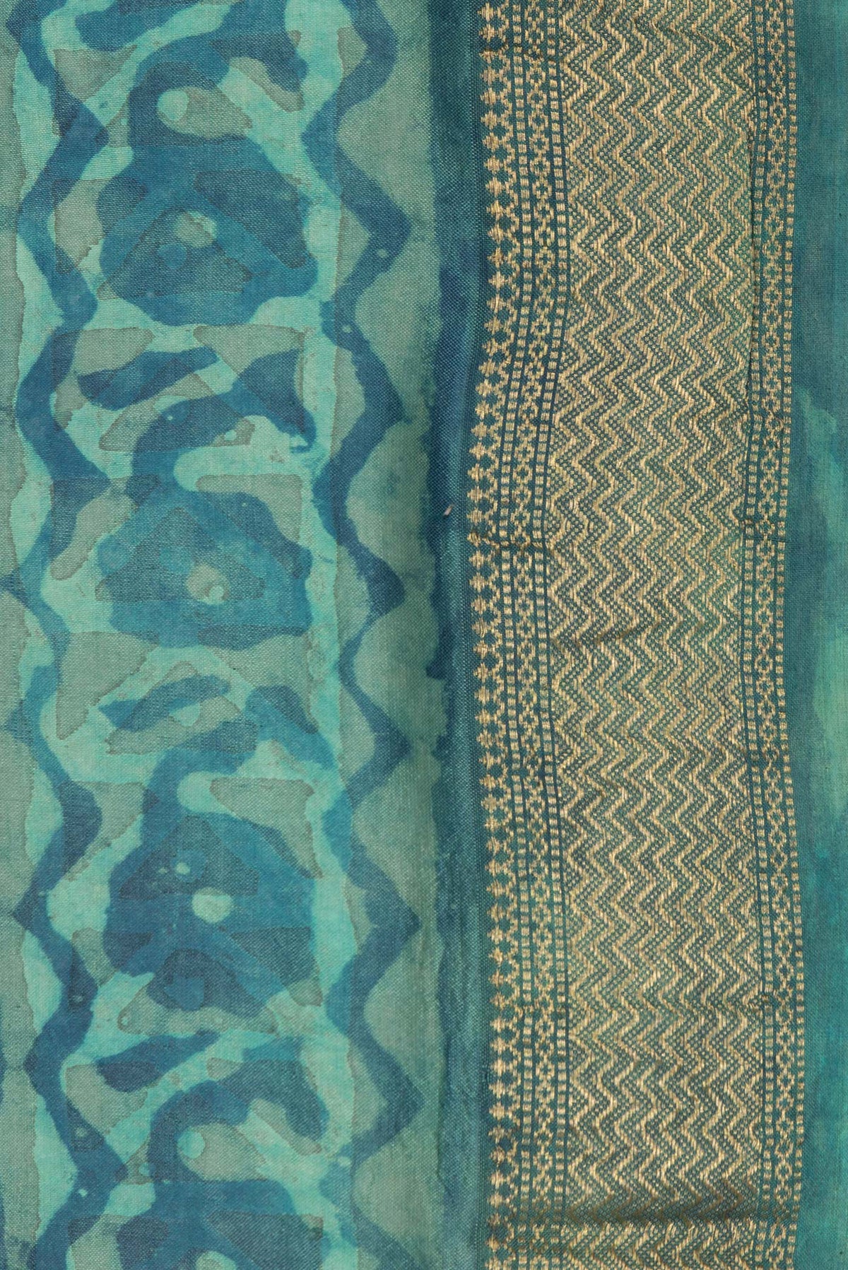 Border image of Pure Silk Blue Dual Tone Tussar Saree with Printed design on the body and Zari Border. 