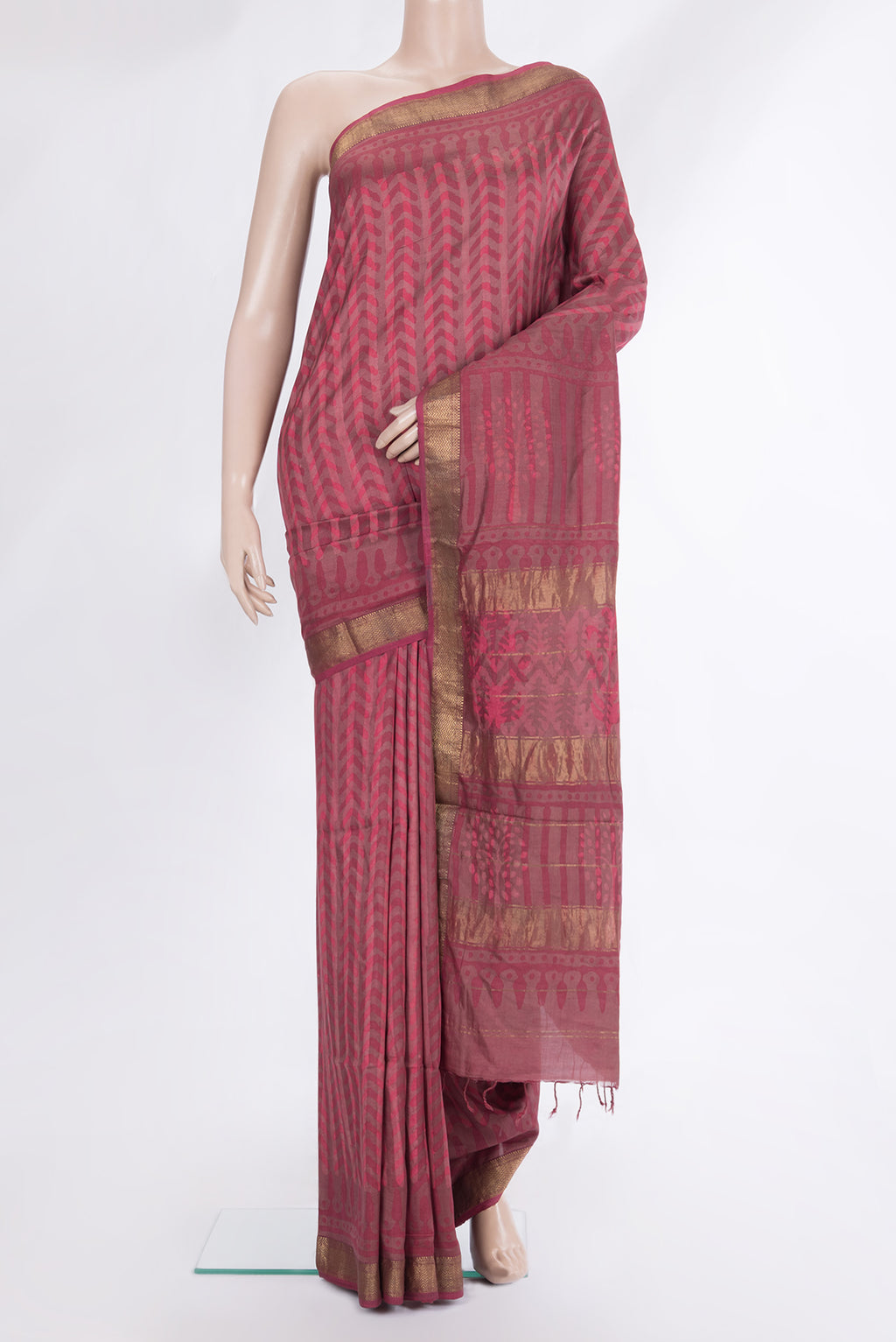 Pure Silk Pink Dual Tone Tussar Saree with Printed design on the body and Zari Border.  displayed on a mannequin