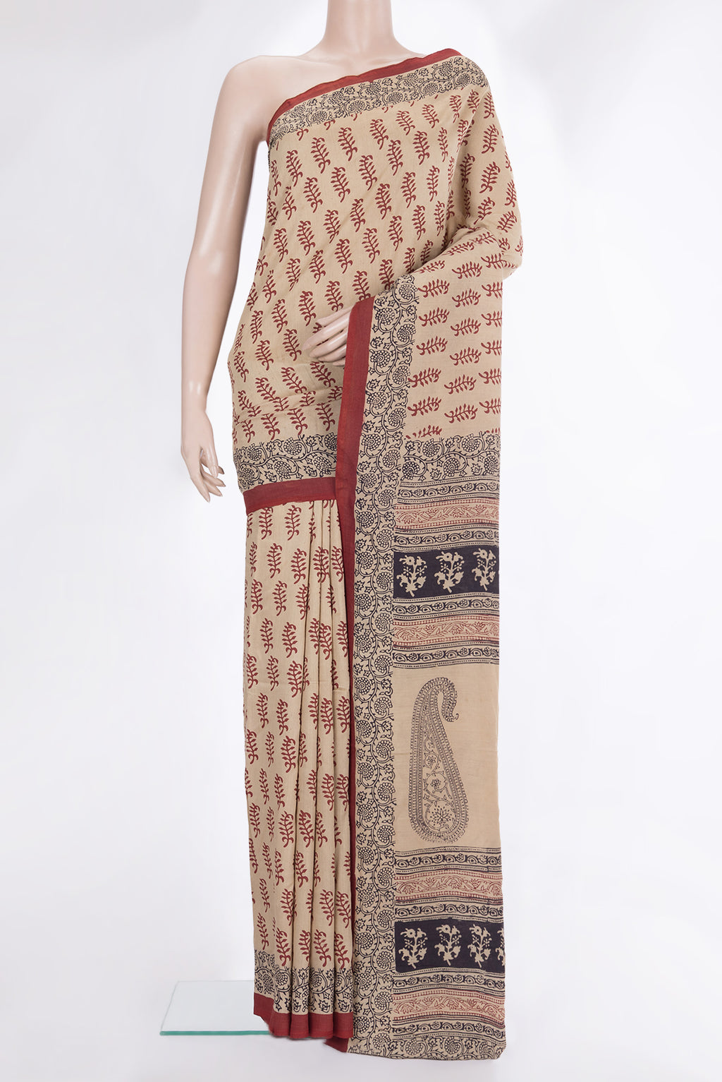 Pure Silk Beige Dual Tone Tussar Saree with Printed design on the body and Printed Border.  displayed on a mannequin