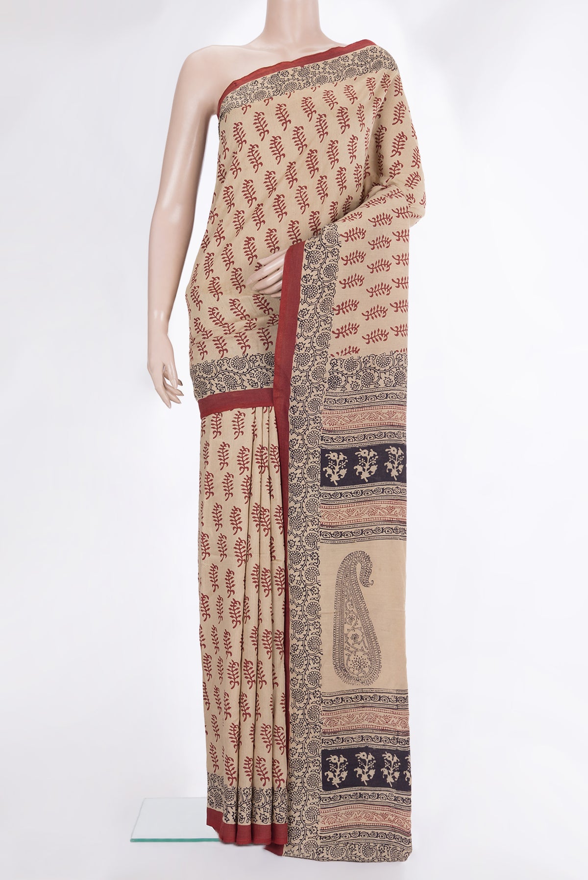 Pure Silk Beige Dual Tone Tussar Saree with Printed design on the body and Printed Border.  displayed on a mannequin