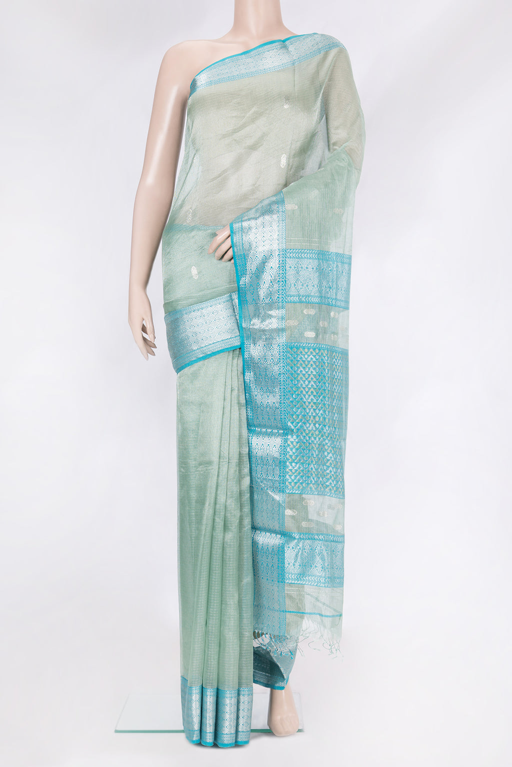 Sea Green Dual Tone Maheshwari Tissue Silk Cotton Saree with Checked design on the body and Zari Border.  displayed on a mannequin