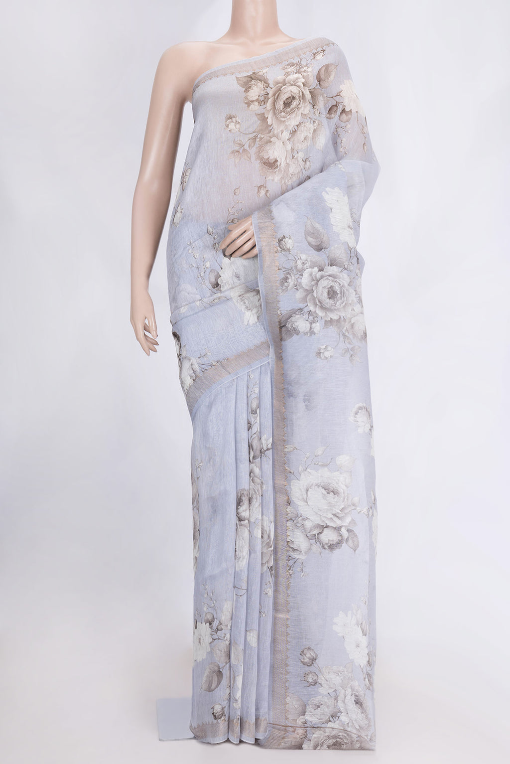Lavender Dual Tone Linen Saree with Printed design on the body and Zari Border.  displayed on a mannequin