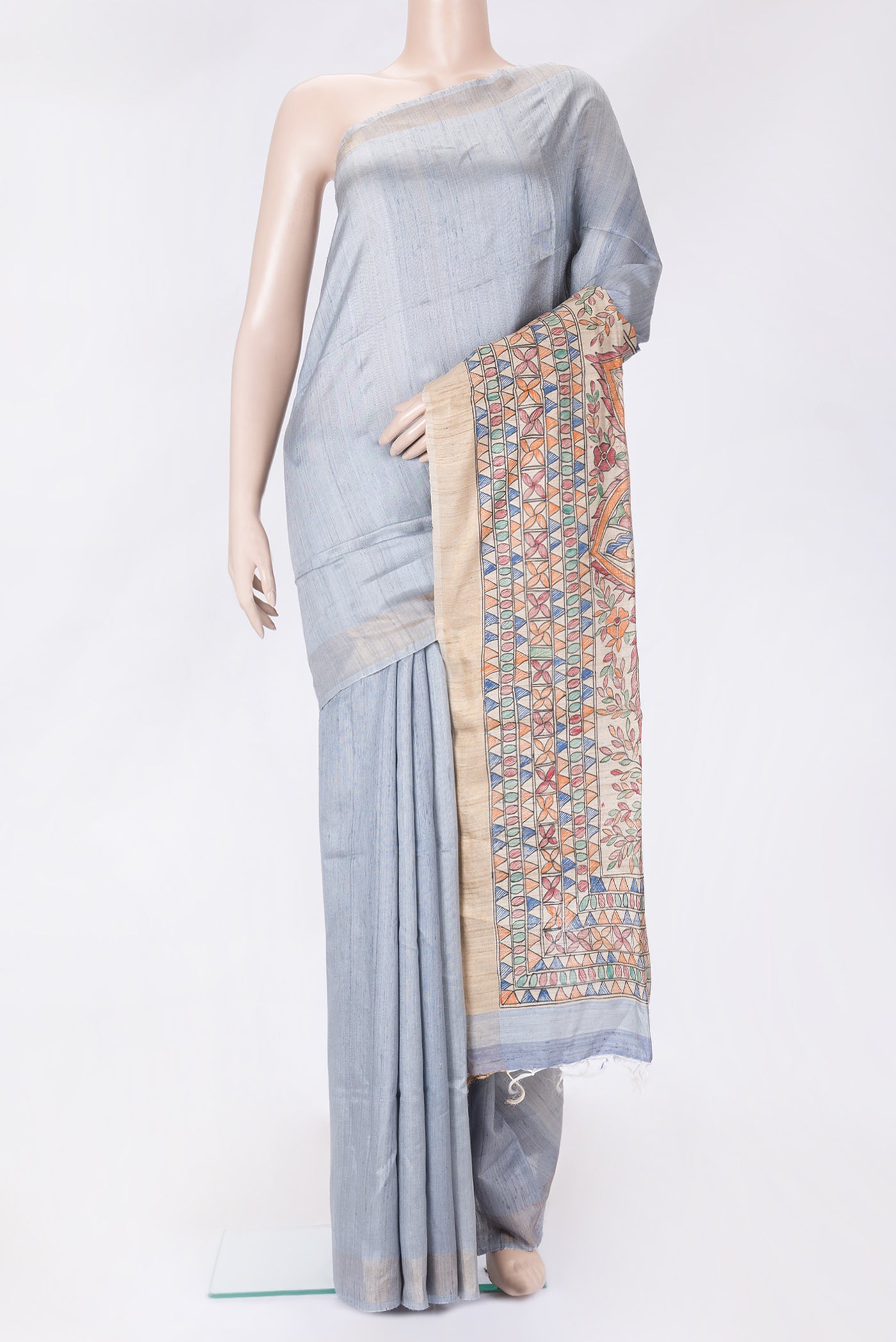 Grey Dual Tone Tussar Silk Saree with Plain Body and Zari Border.  displayed on a mannequin
