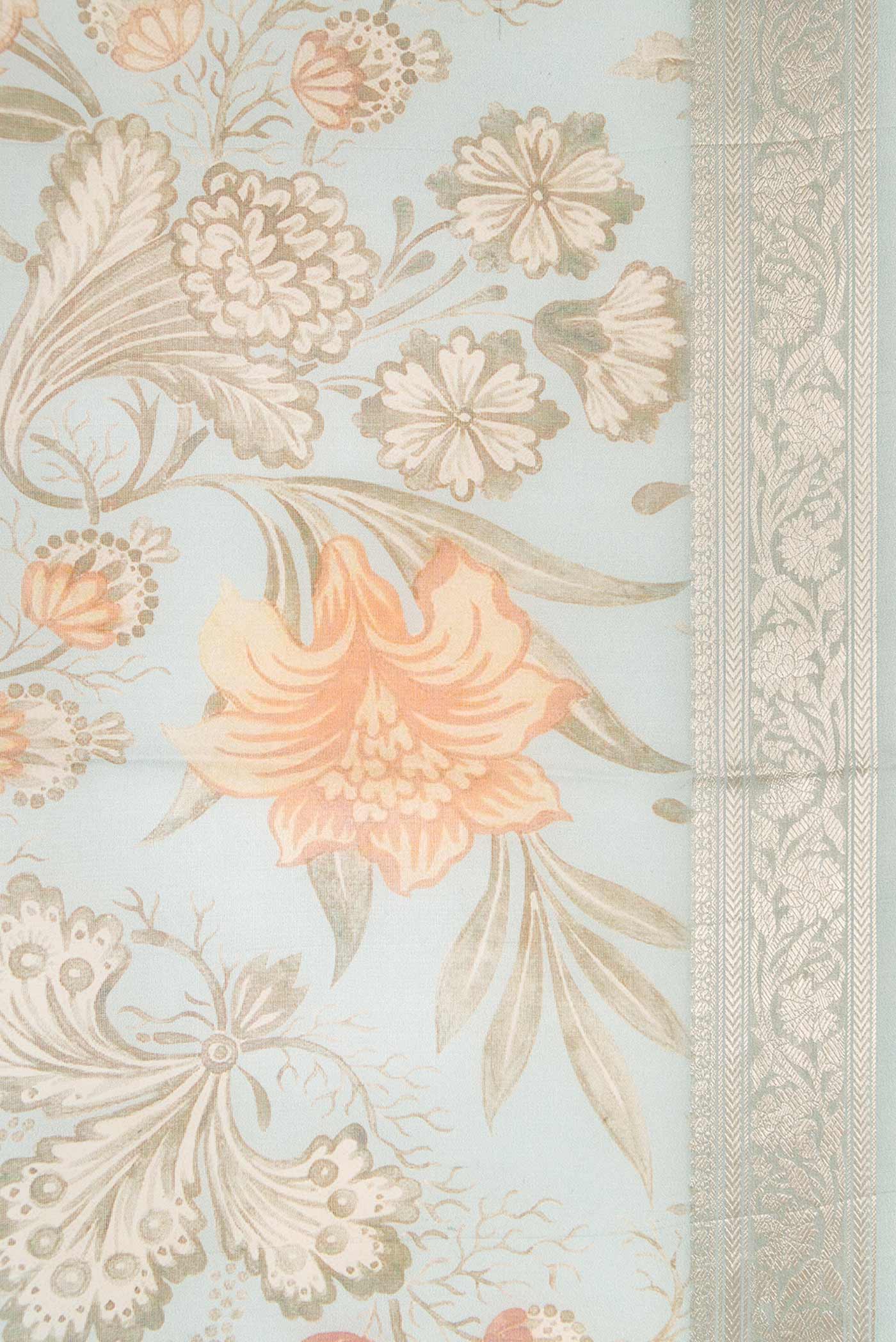 Border image of Light Blue Dual Tone Organza Silk Saree with Printed design on the body and Zari Border. 