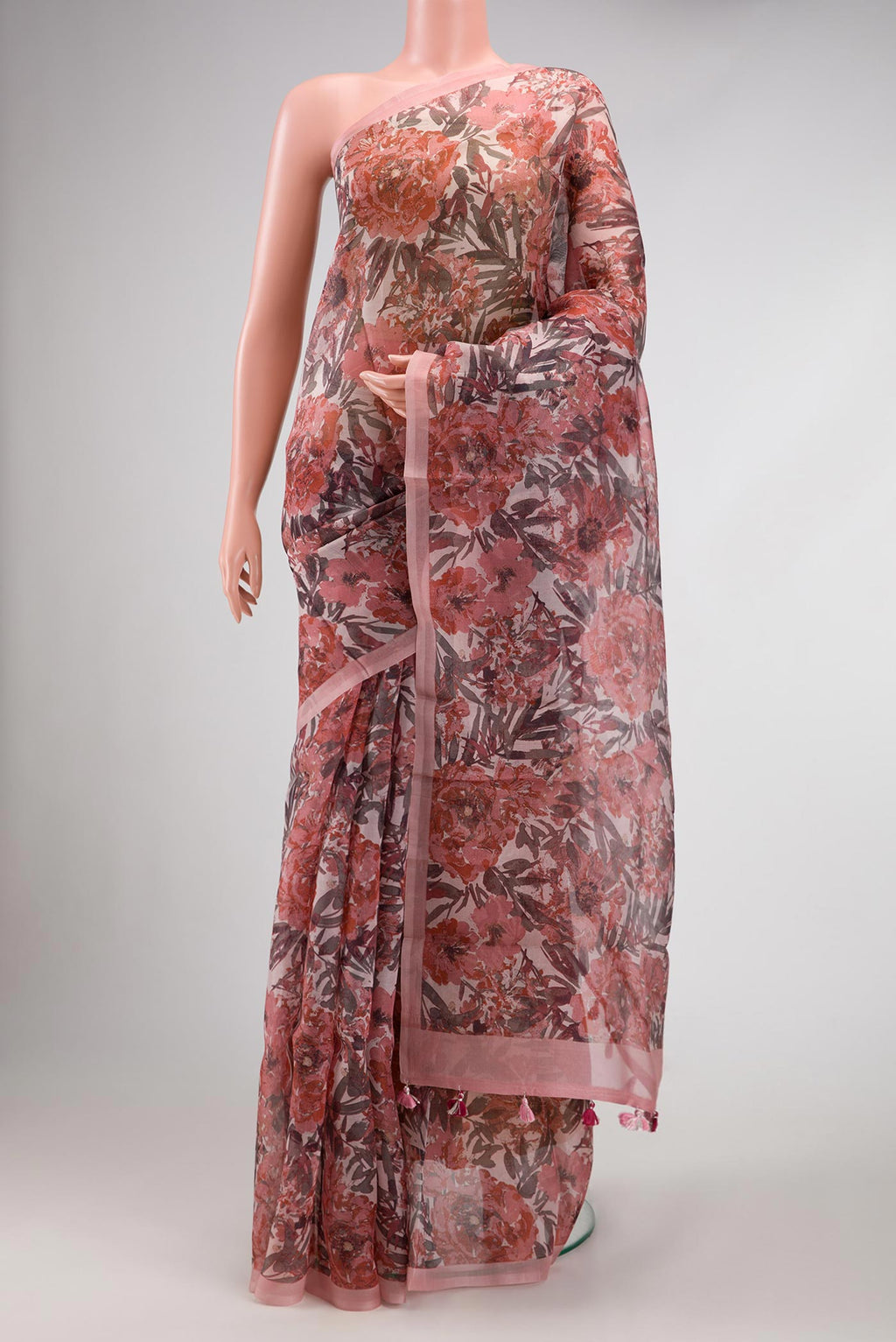 Pink Dual Tone Organza Silk Saree with Printed design on the body and Plain Border.  displayed on a mannequin