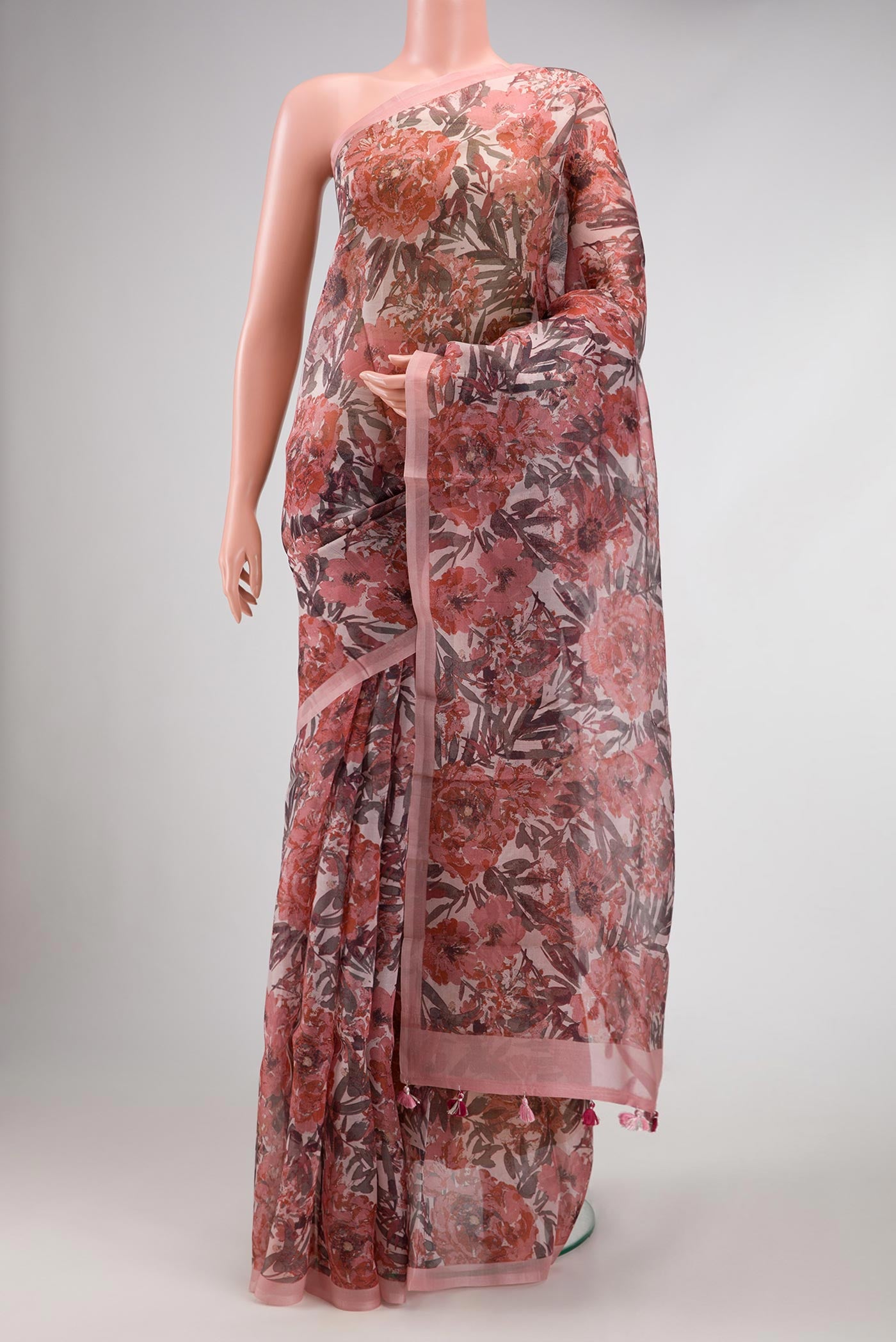 Pink Dual Tone Organza Silk Saree with Printed design on the body and Plain Border.  displayed on a mannequin