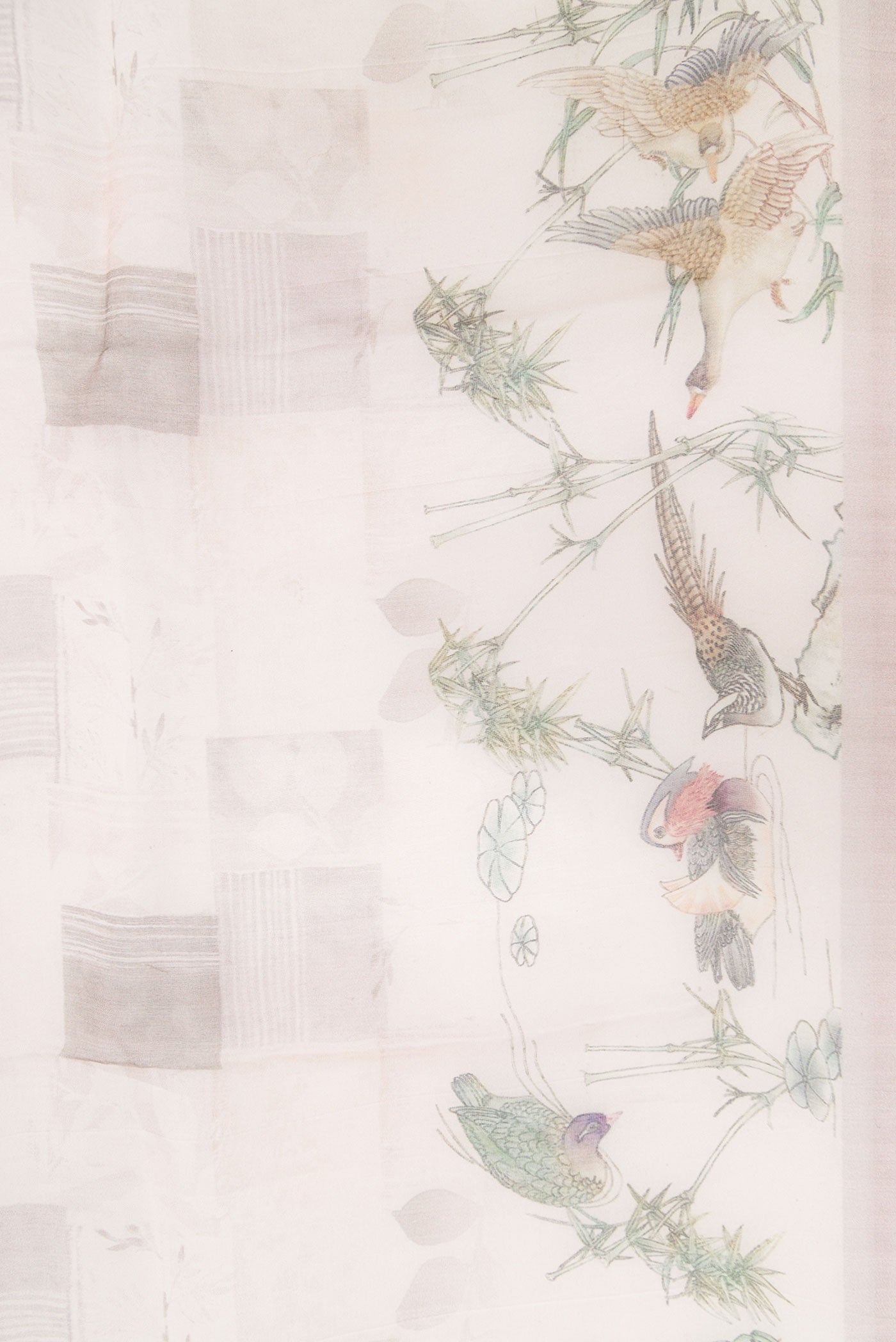 Border image of Rose Gold Dual Tone Organza Silk Saree with Printed design on the body and Printed Border. 