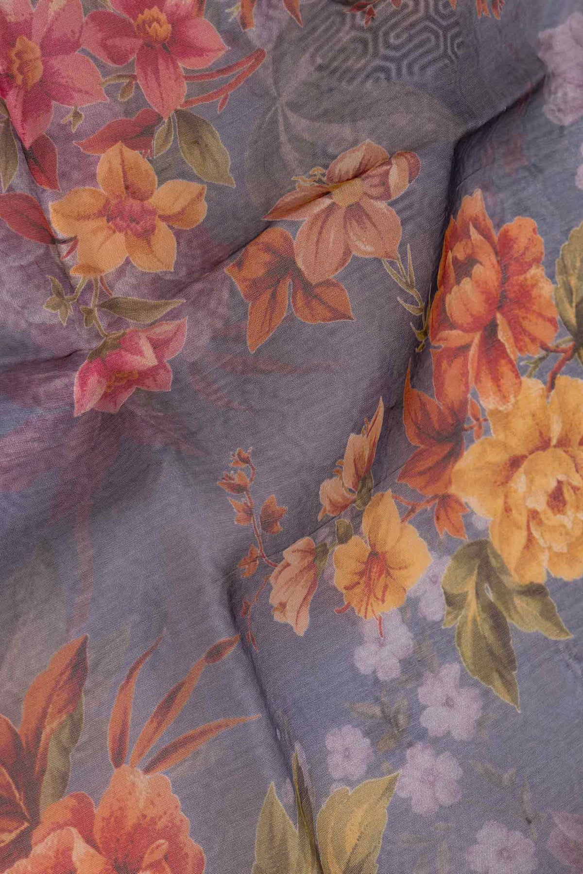 Close up of Lavender Dual Tone Organza Silk Saree with Printed design on the body and Without Border displaying folds