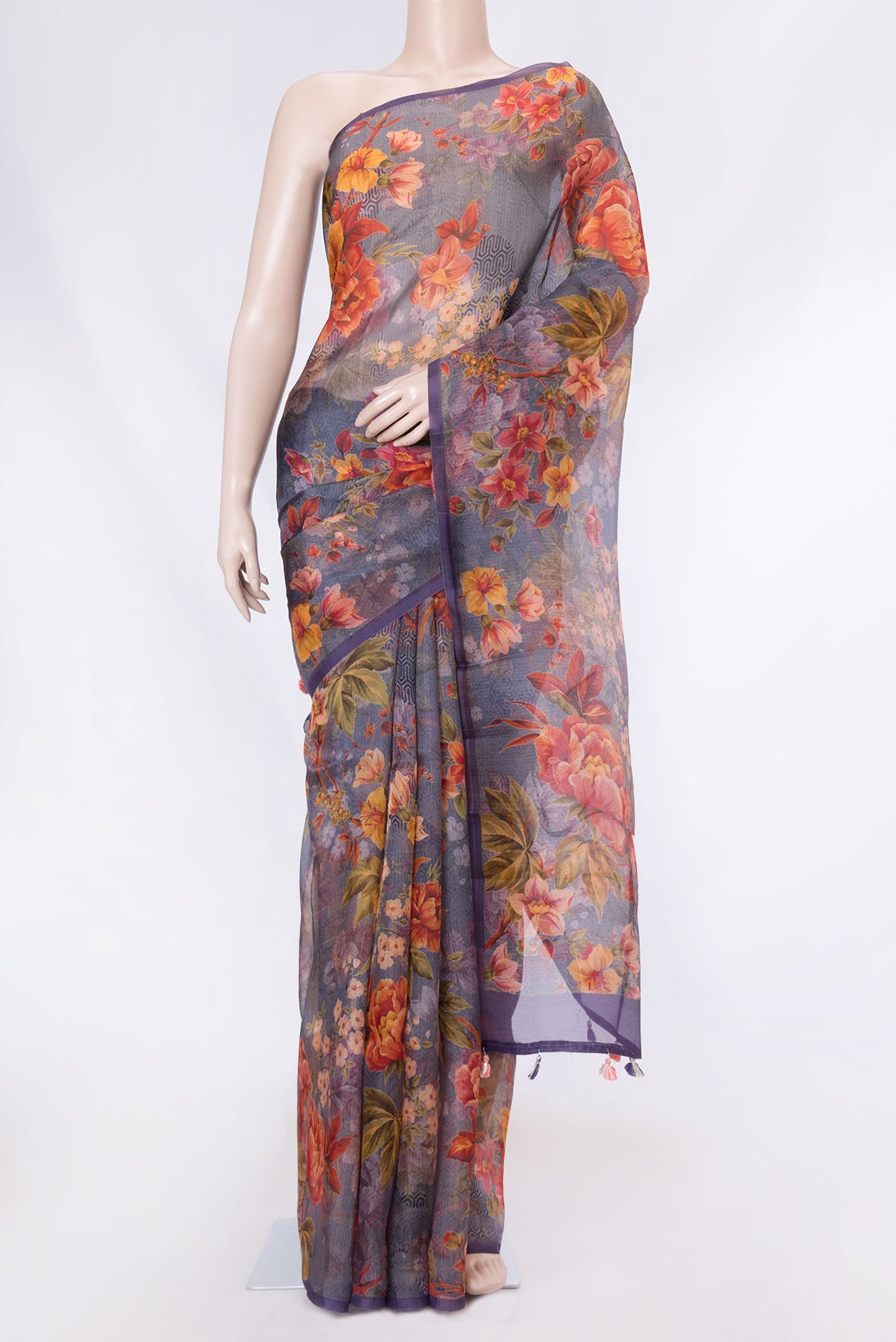 Lavender Dual Tone Organza Silk Saree with Printed design on the body and Without Border displayed on a mannequin