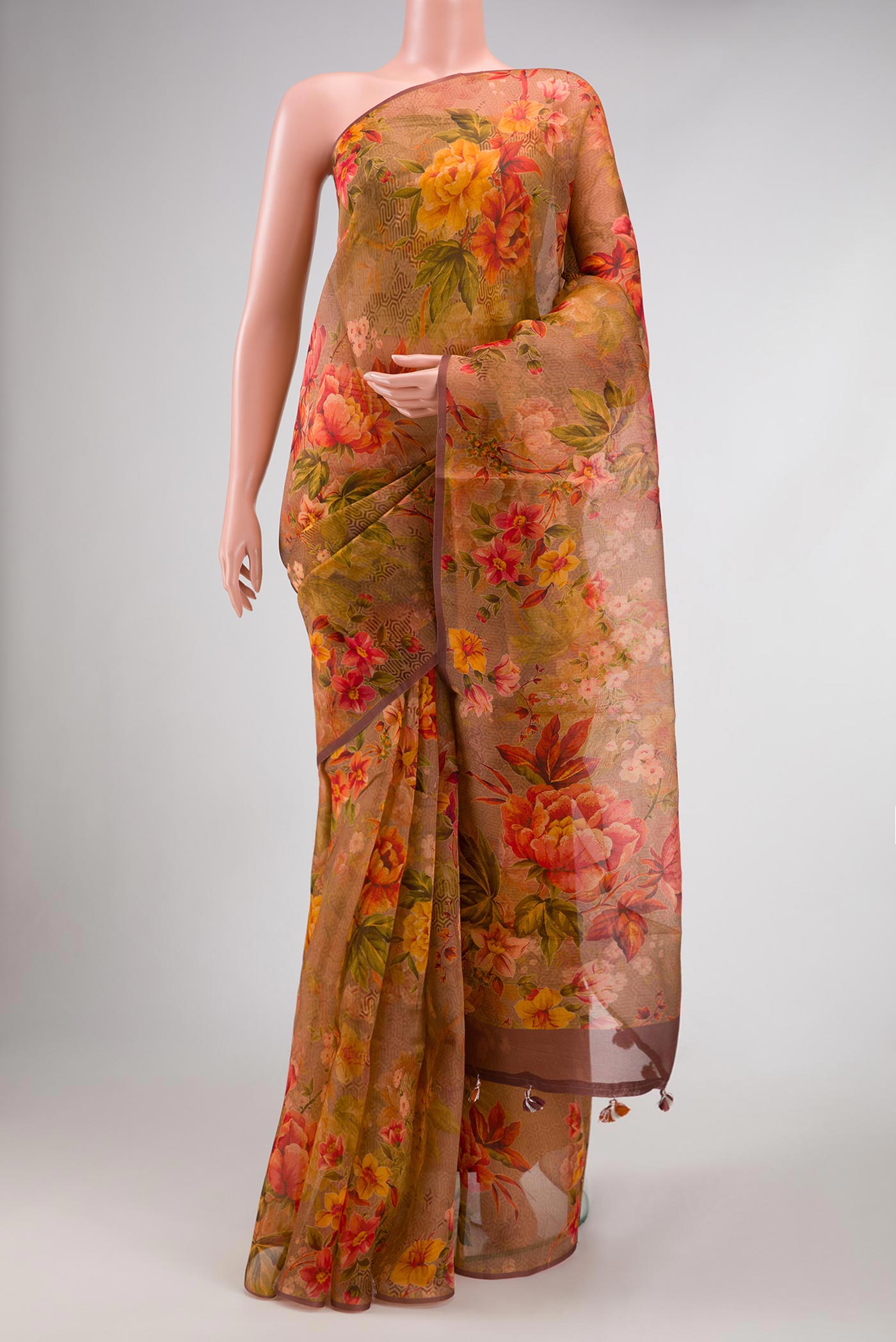 Brown Dual Tone Organza Silk Saree with Printed design on the body and Without Border.  displayed on a mannequin