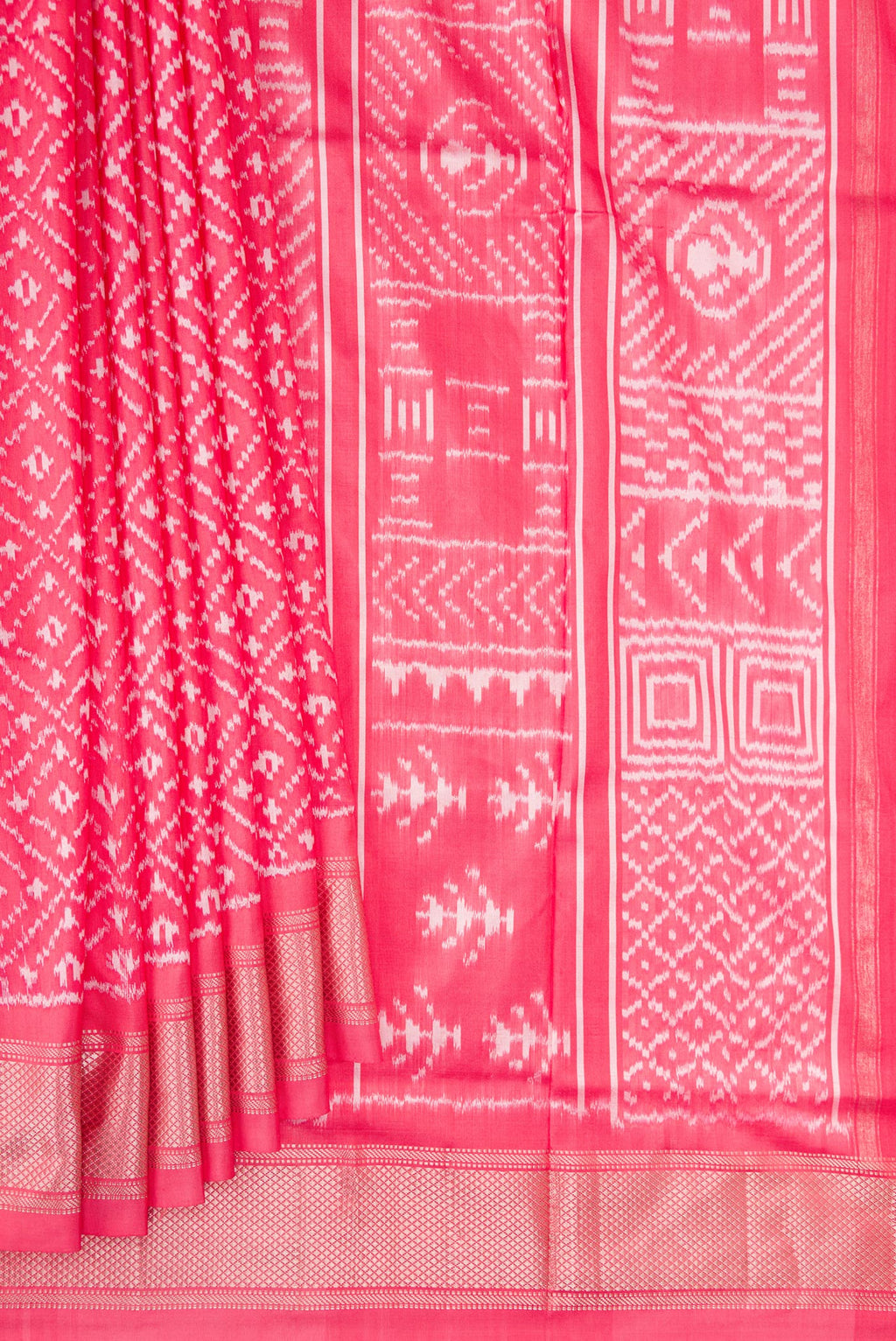 Pleats and pallu of Pure Silk Coral Dual Tone Pochampally Saree with Ikat design on the body and Zari Border. 
