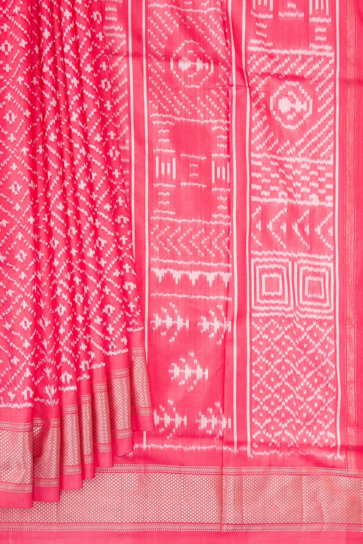 Pleats and pallu of Pure Silk Coral Dual Tone Pochampally Saree with Ikat design on the body and Zari Border. 