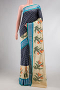 Navy Blue Dual Tone Double Ikat Saree with Ikat Print on the body and Zari Border.  displayed on a mannequin