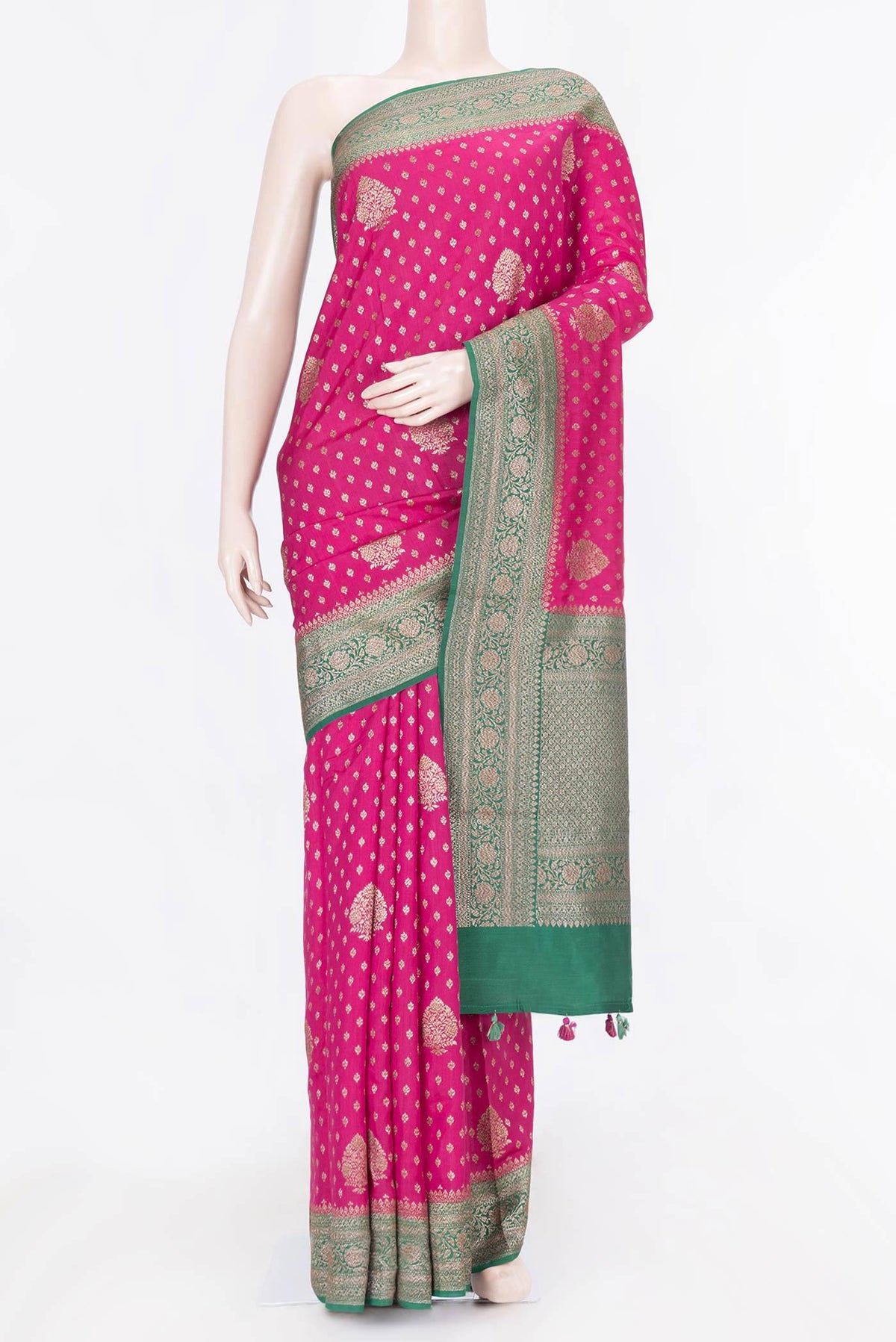Rani Pink Dual Tone Tussar Silk Saree with Zari Butta on the body and Zari Border displayed on a mannequin