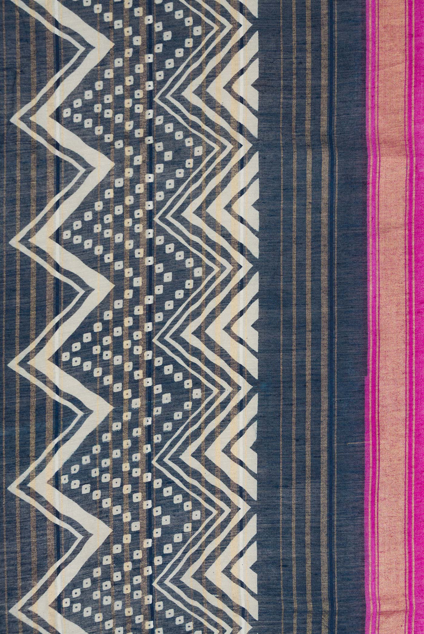 Border image of Navy Blue Dual Tone Tussar Silk Saree with Printed design on the body and Zari Border. 