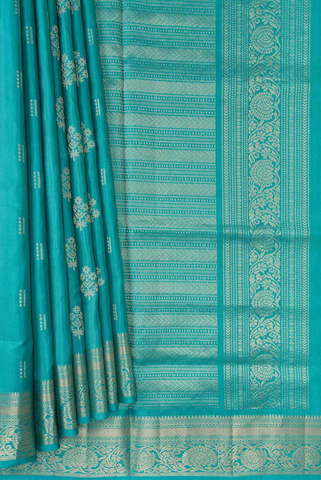 Pleats and pallu of Sky Blue Dual Tone Soft Silk Saree with Zari Butta on the body and Zari Border. 