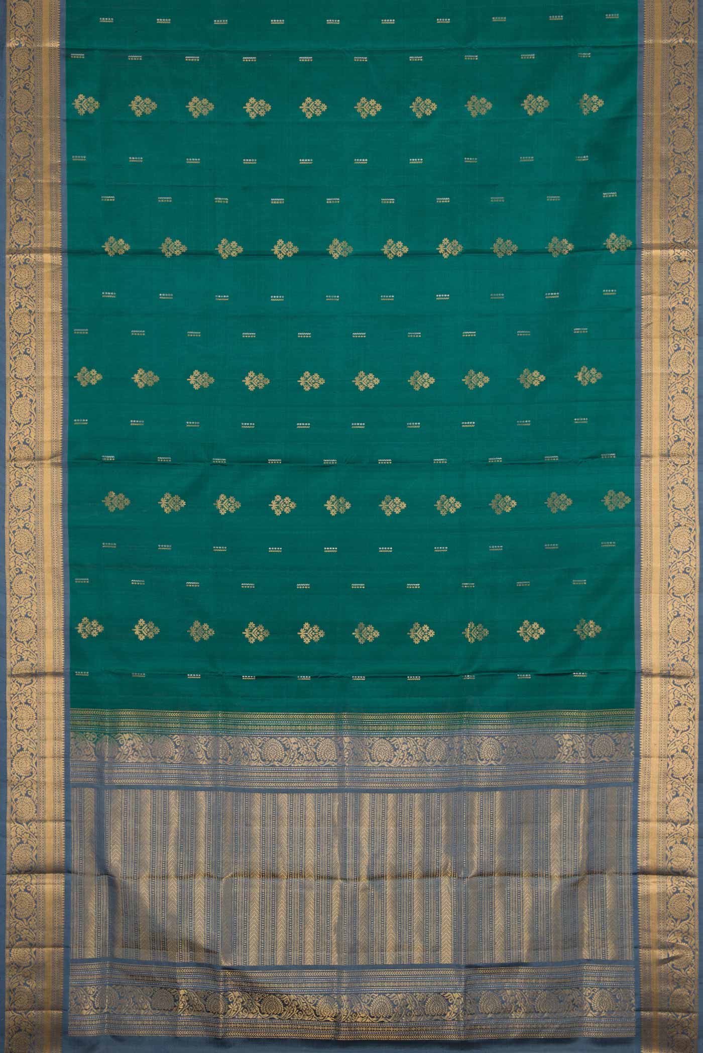 Flat view of Green Dual Tone Soft Silk Saree with Zari Butta on the body and Zari Border. 