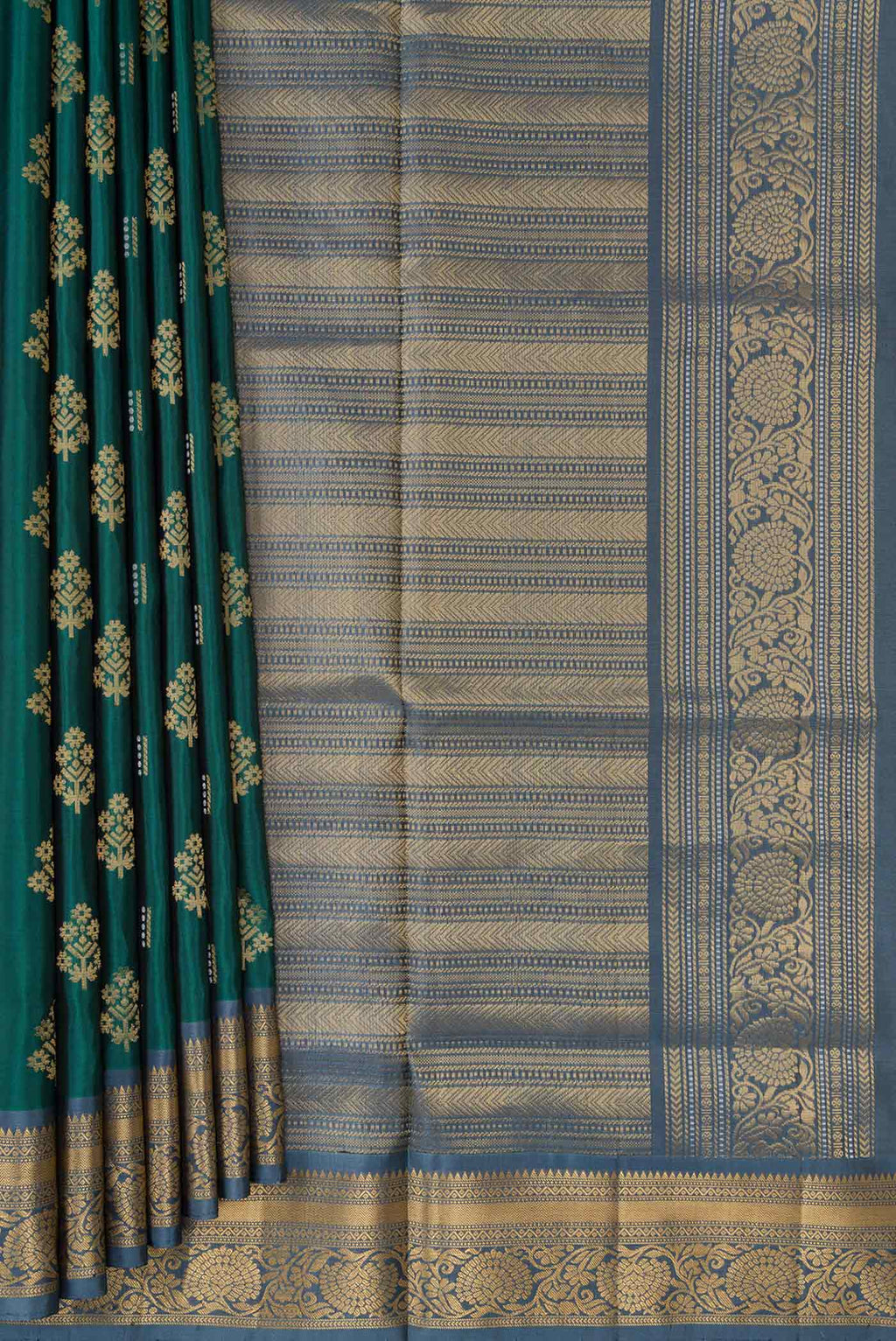 Pleats and pallu of Green Dual Tone Soft Silk Saree with Zari Butta on the body and Zari Border. 