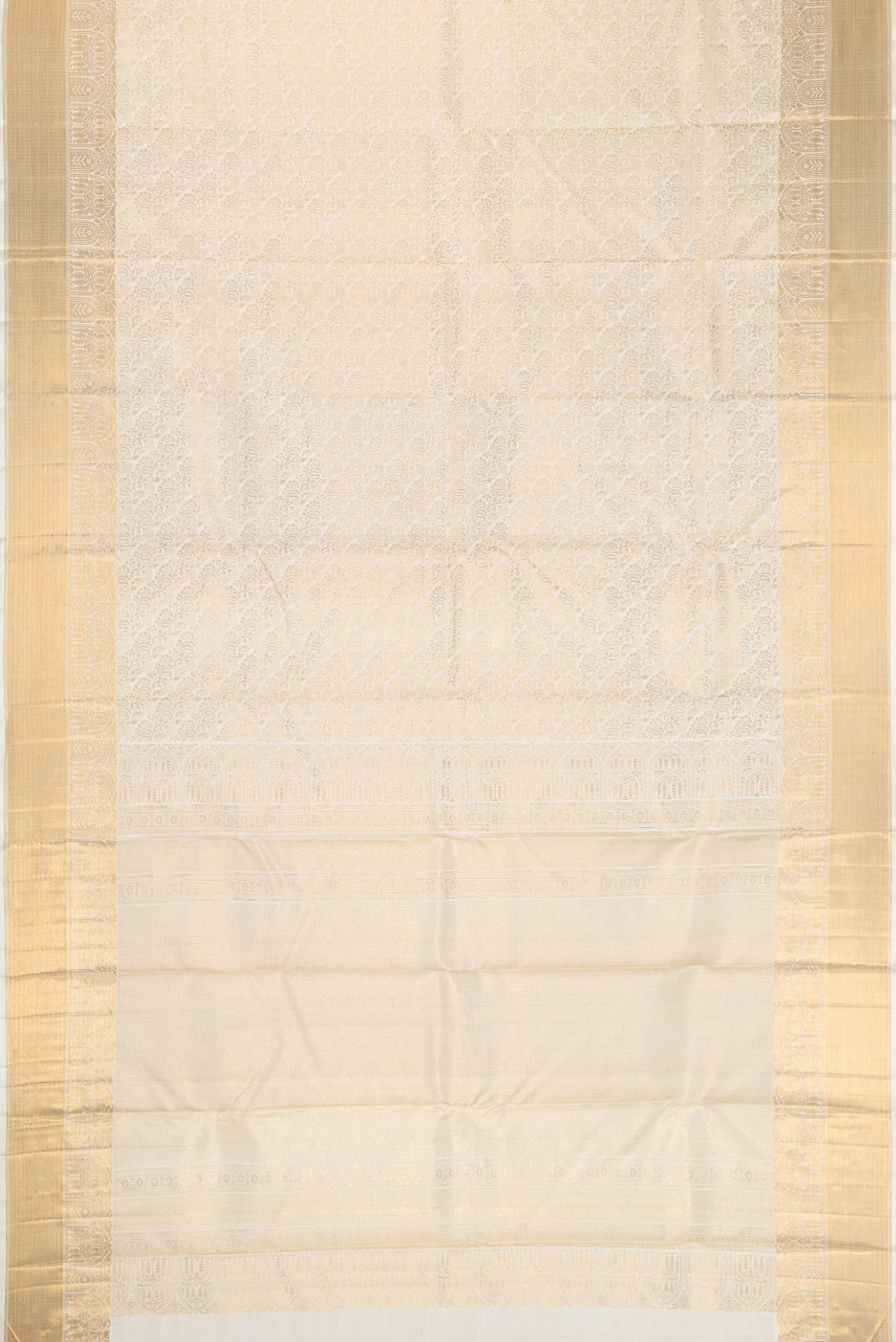 Flat view of Off White Dual Tone Kanchipuram Silk Saree with Zari Brocade on the body and Zari Border. 
