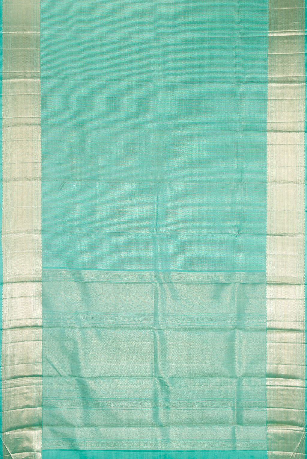 Flat view of Sea Green Kanchipuram Silk Saree with Zari Brocade on the body and Zari Border. 