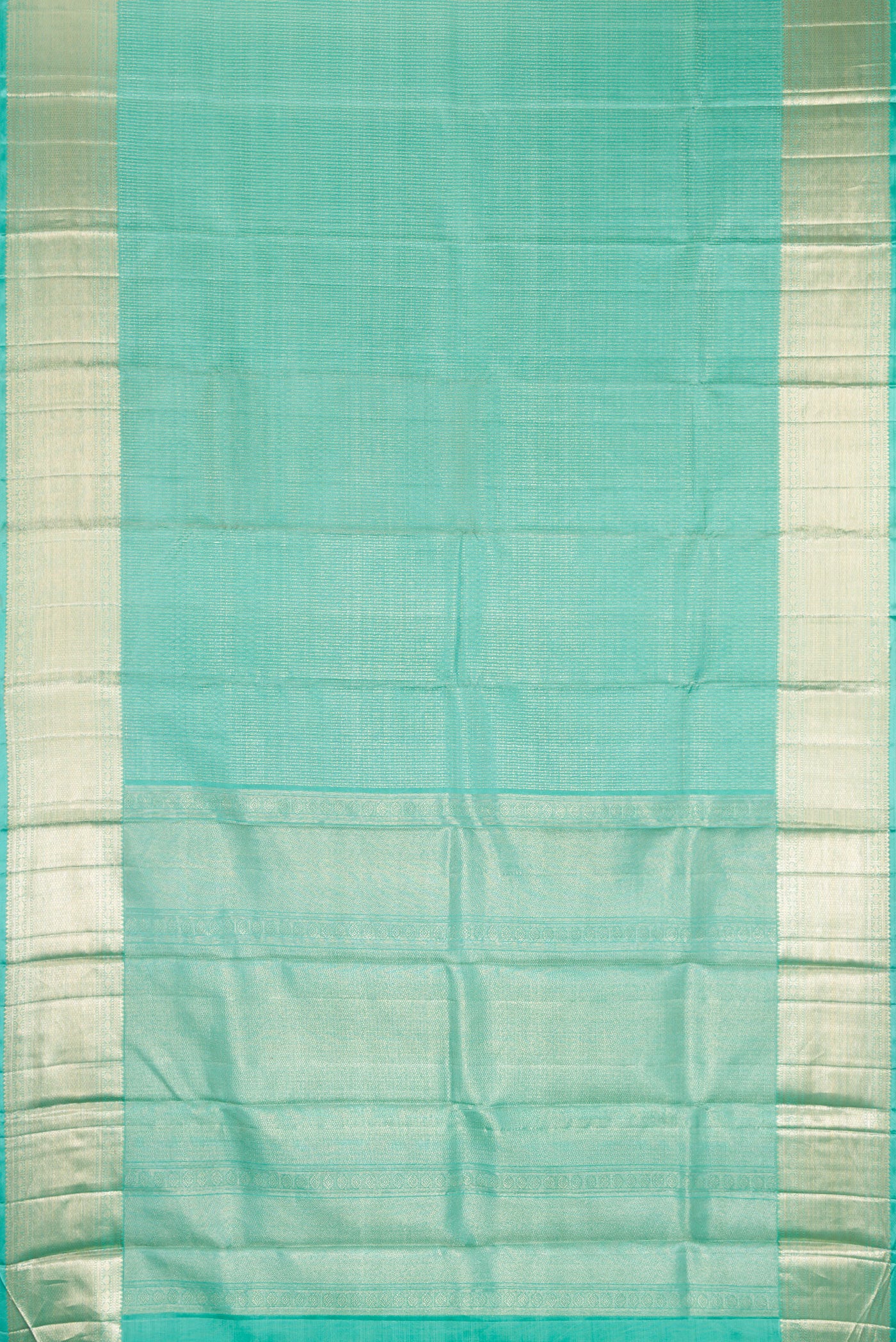 Flat view of Sea Green Kanchipuram Silk Saree with Zari Brocade on the body and Zari Border. 